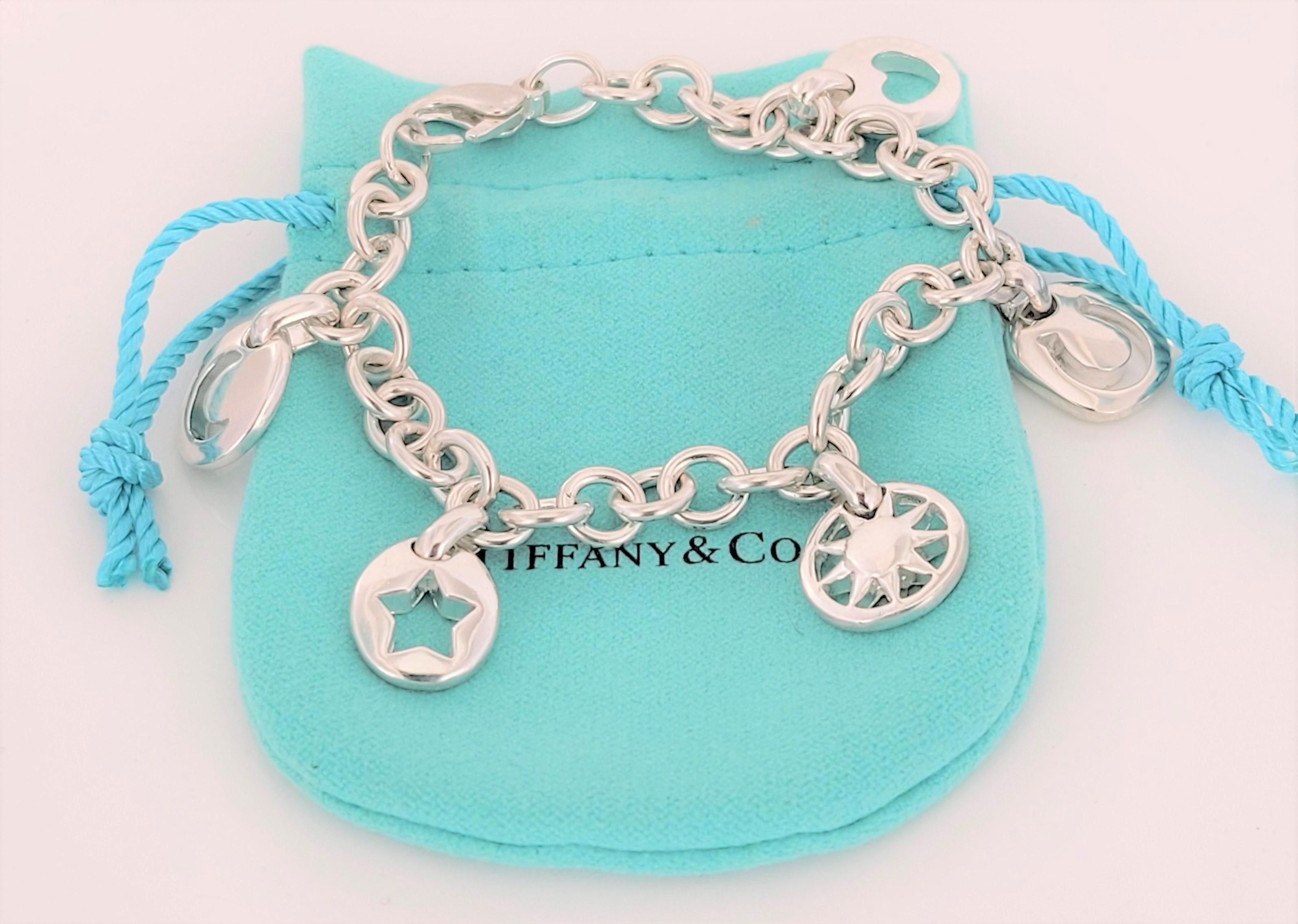 Tiffany & Co Silver Heart Sun Star Moon Horseshoe Charm Bracelet Neuf - En vente à New York, NY