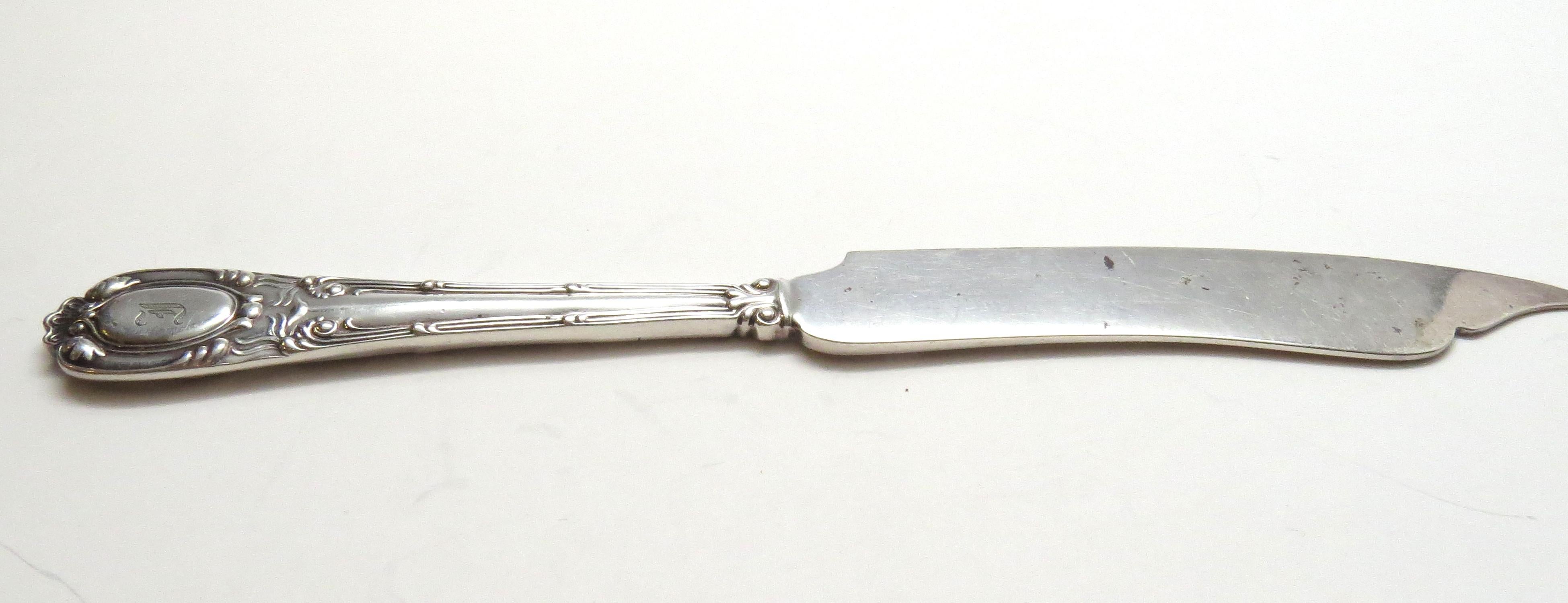 Tiffany & Co. silver plate old French fish knife. 
Measures: Approx 7 7/8 inches in length, approx. 3/4 inch wide at its widest part. 
Weight: 50.4 g / 32.4 dwt. 
Condition: In good condition with surface scratches and minor tarnishing. 
Hallmark: