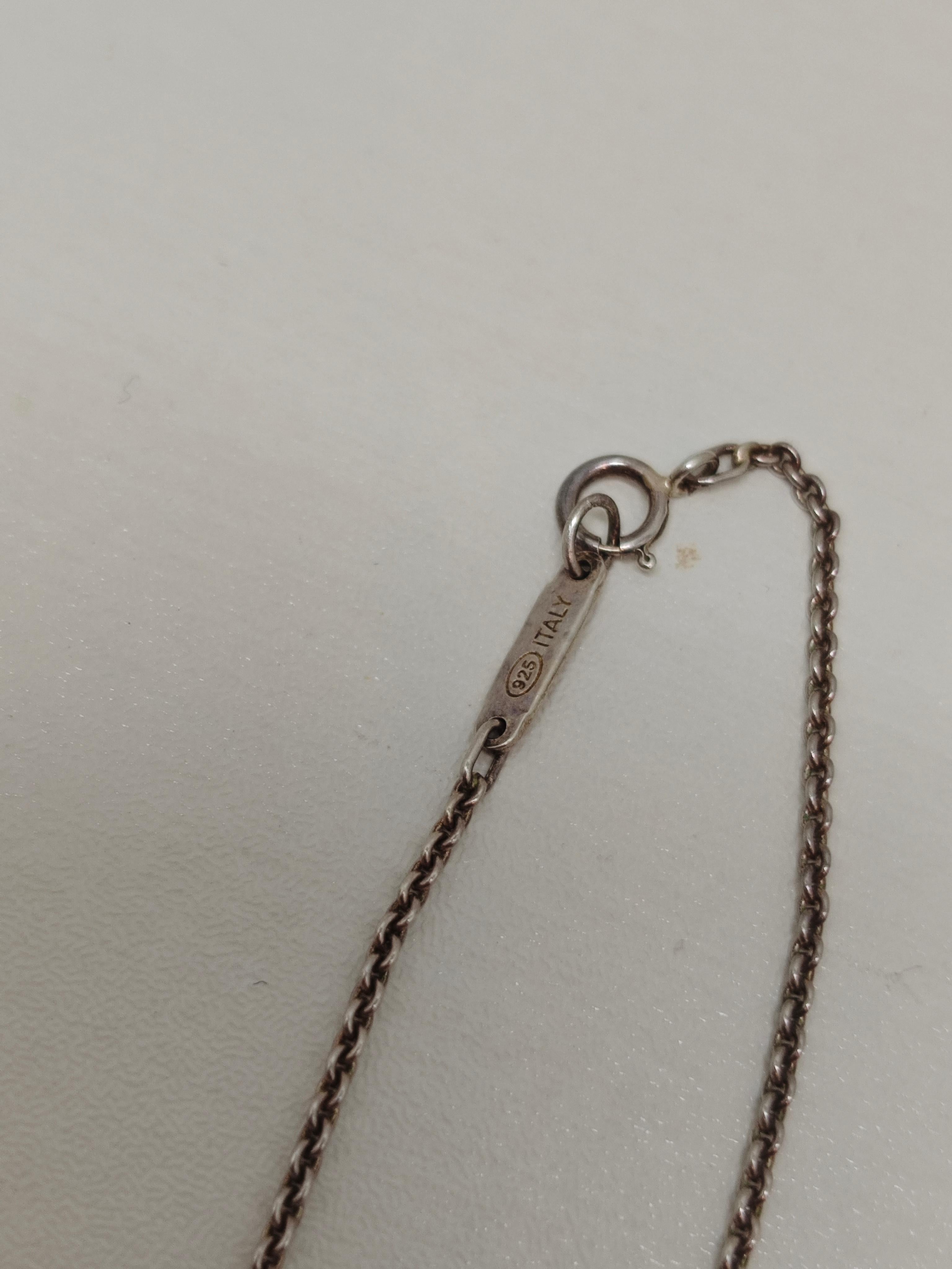 Contemporary Tiffany & Co. Silver Roman Numeral Cube Necklace For Sale