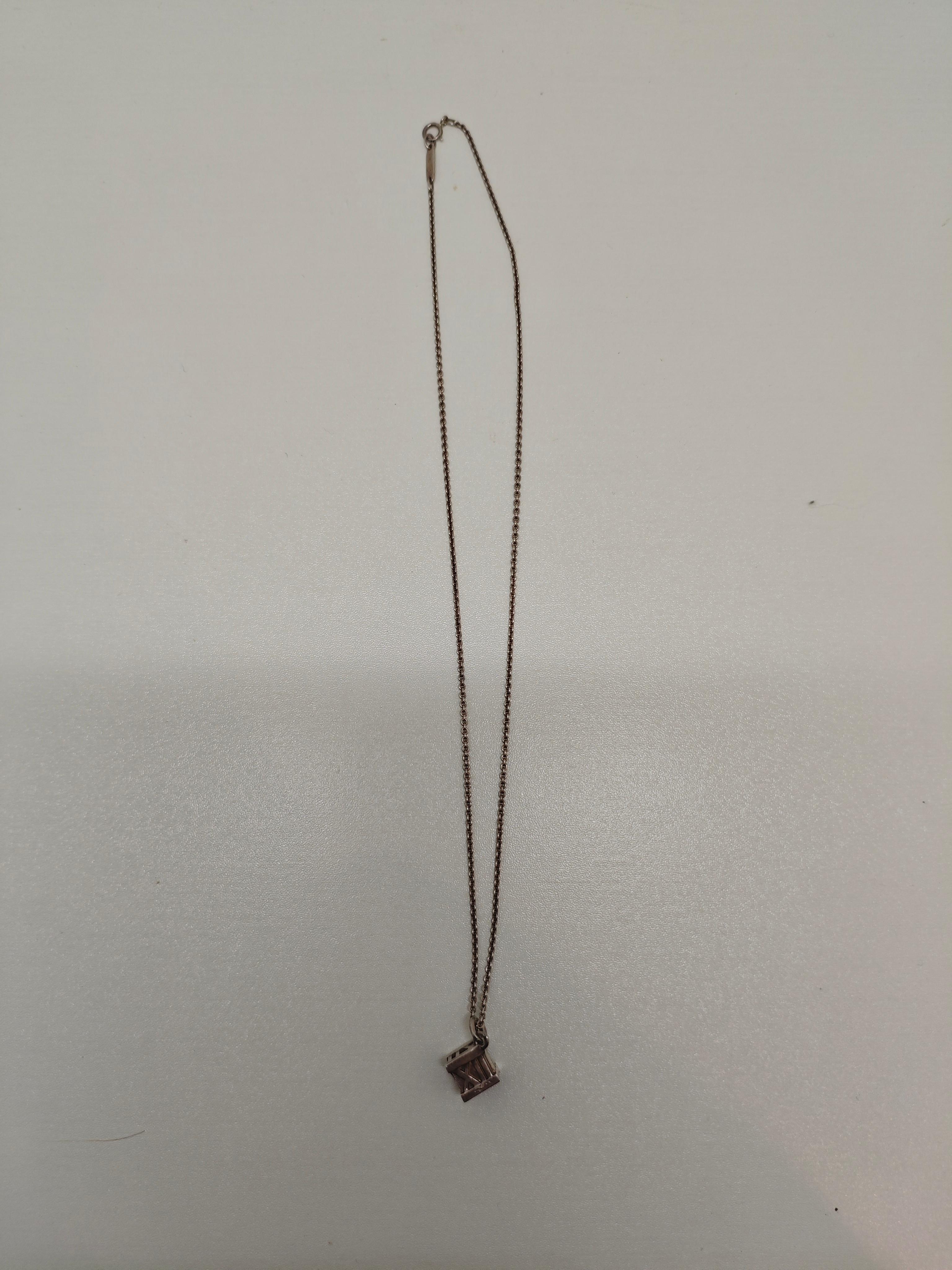 Tiffany & Co. Silver Roman Numeral Cube Necklace For Sale 1