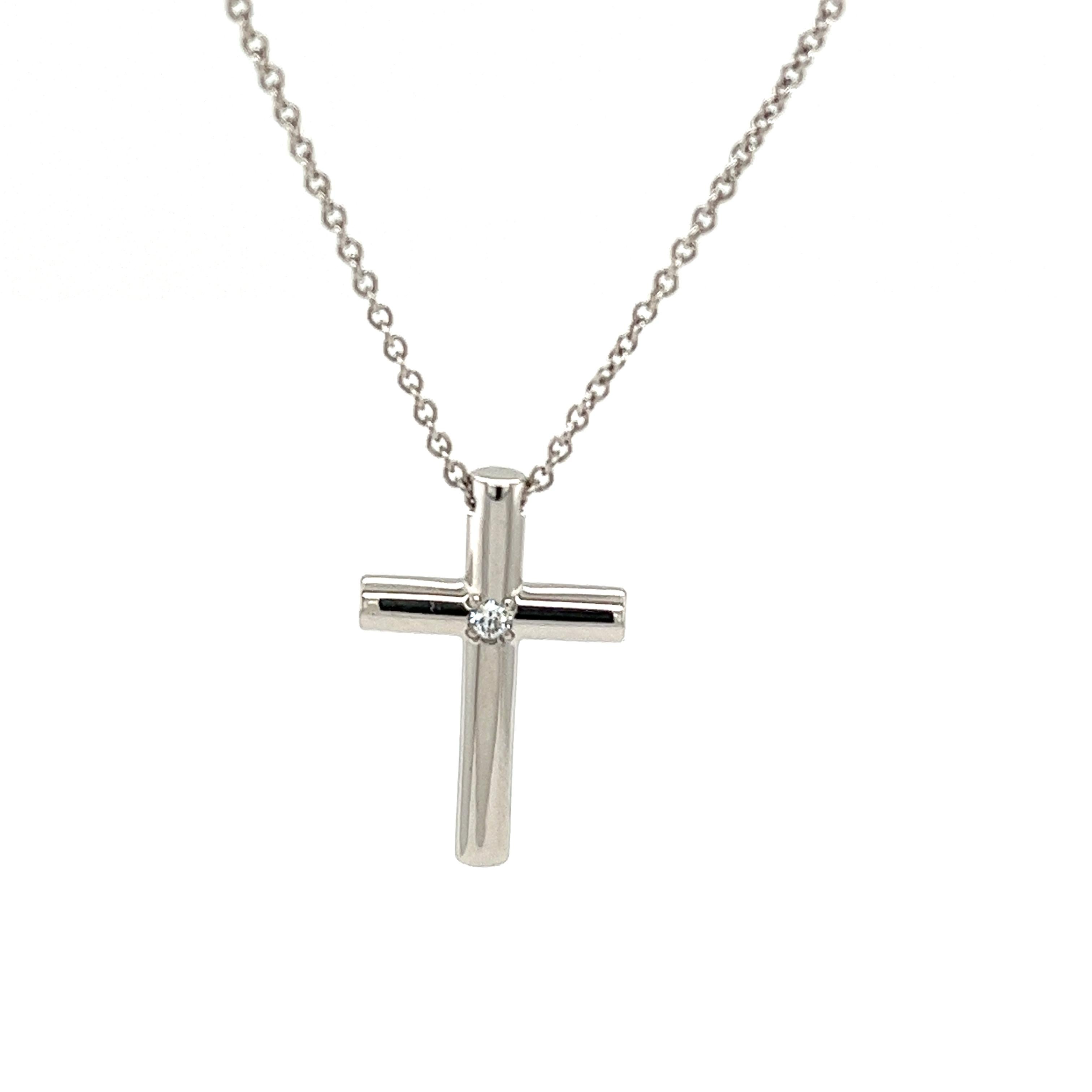 The Tiffany & Co. Single Diamond Cross Pendant on an 18
