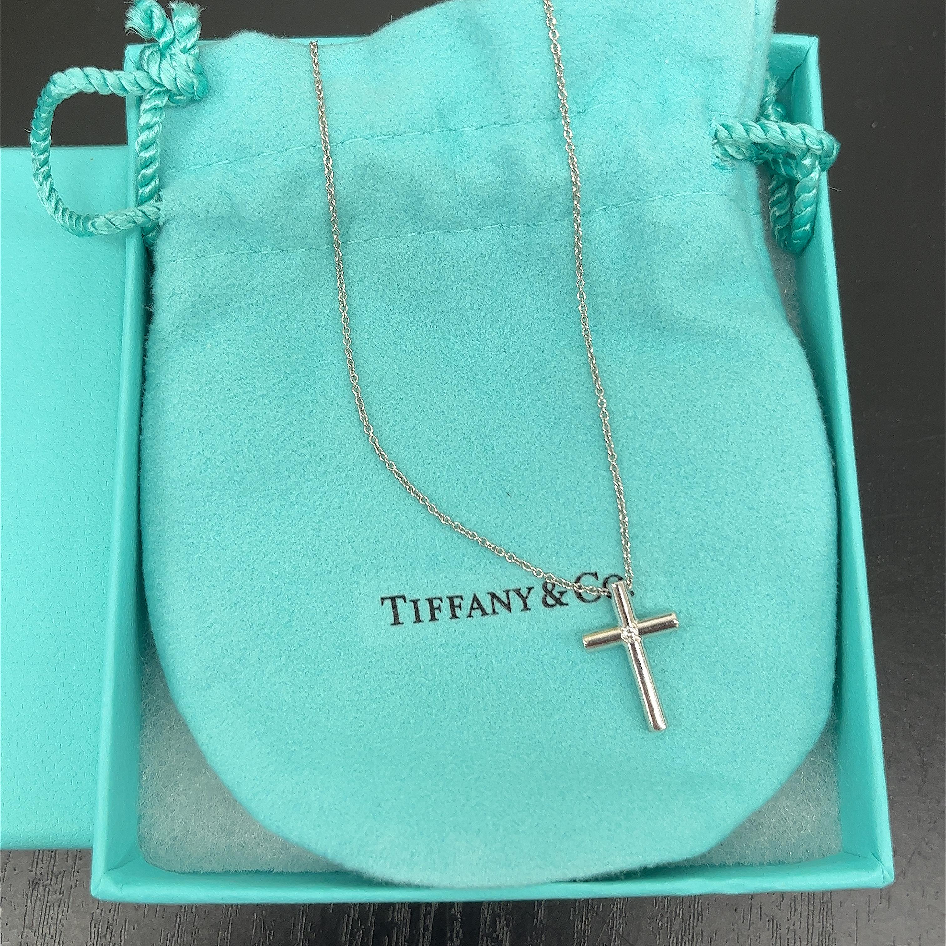 Round Cut Tiffany & Co. Single Diamond Cross Pendant on 18