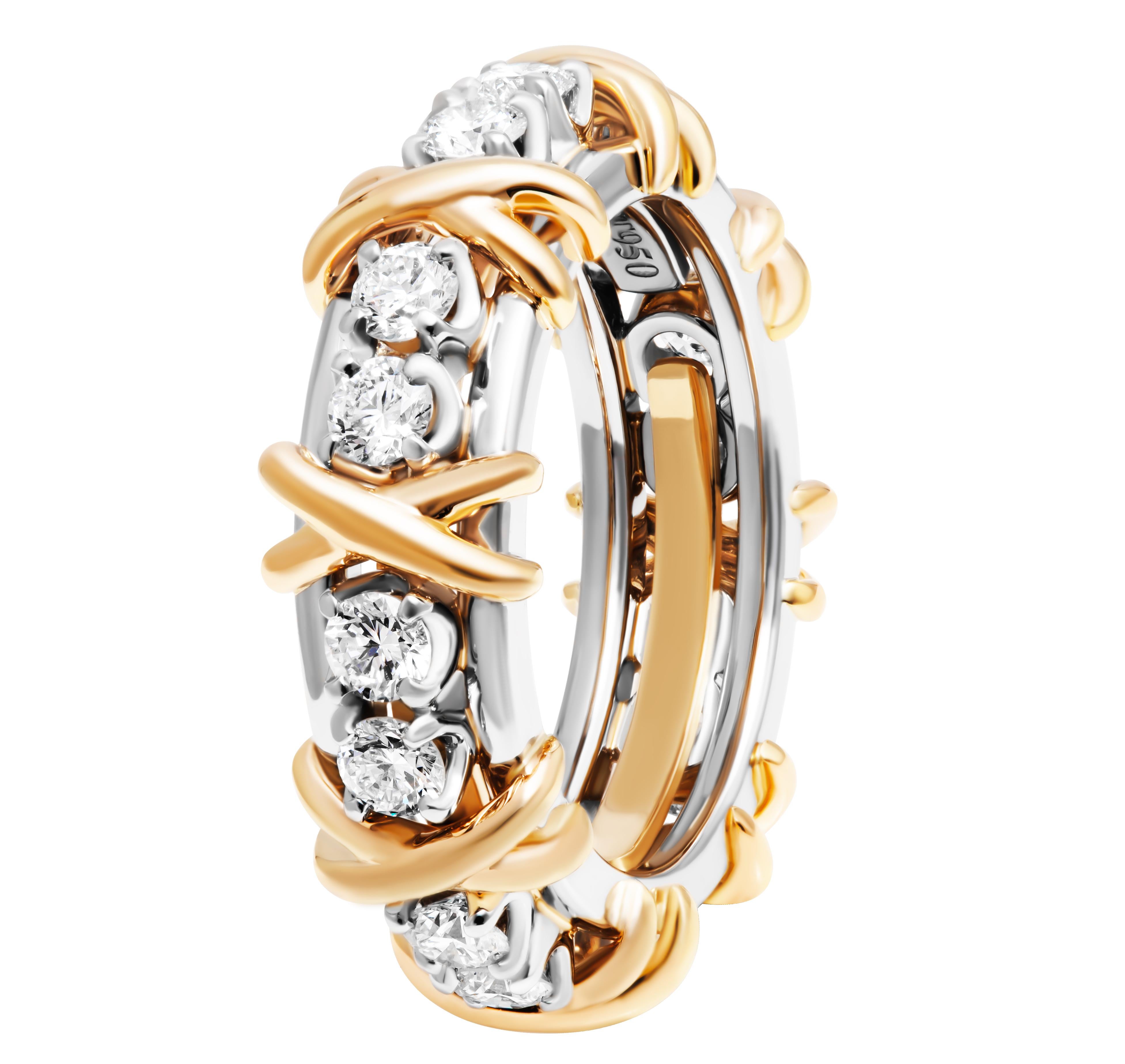 Tiffany & Co. Seize pierres en platine et or jaune 18k avec diamants
Or 18k et platine avec diamants ronds de taille brillant
Poids total en carats 1.00ct
Taille 6.5