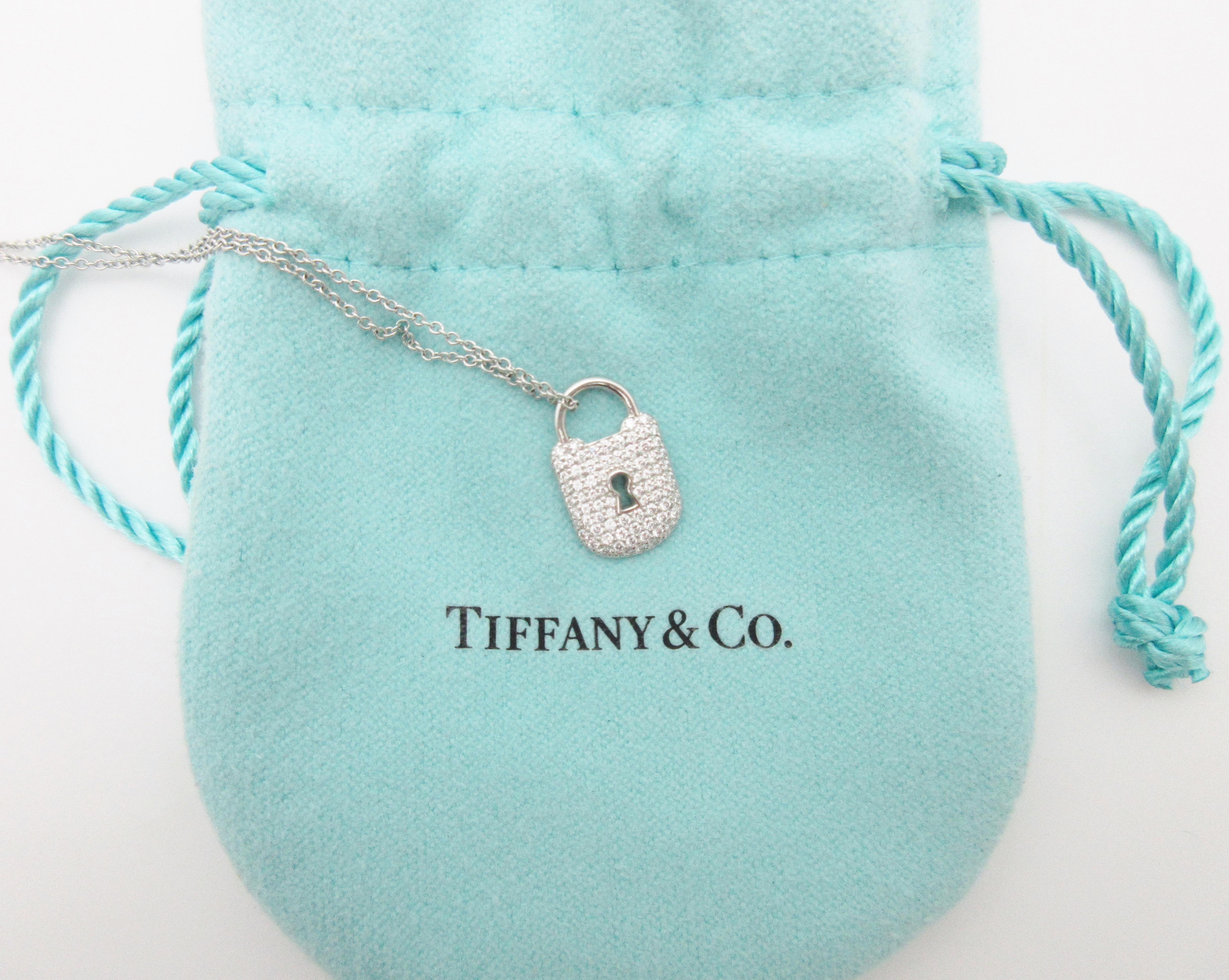 This diamond-studded, platinum padlock necklace from Tiffany & Company is a delicate look with a sparkly punch.

The piece features 67 bright white, round brilliant diamonds totaling approximately .50cttw. set in a platinum padlock. The lock itself