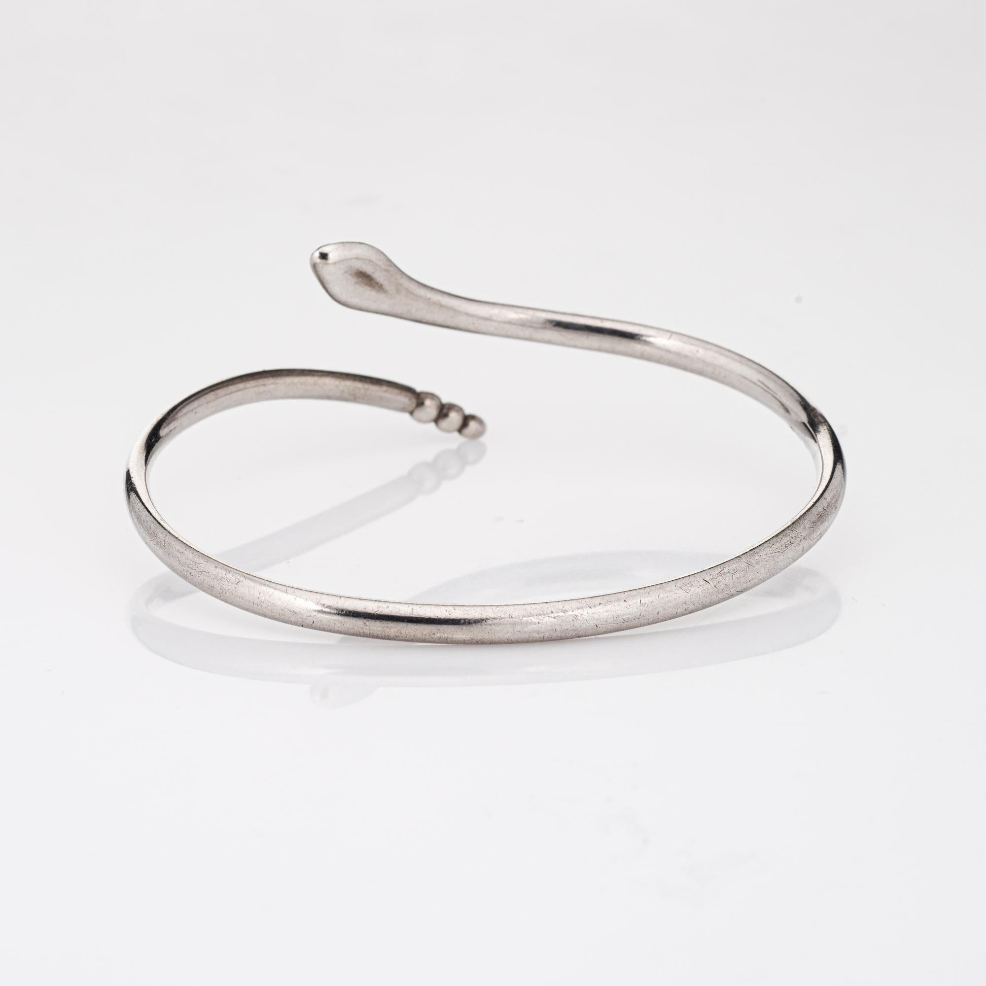 Stylish and finely detailed estate Tiffany & Co snake bracelet crafted in sterling silver.  

The classic snake bracelet was designed by the famed Elsa Peretti. Measuring 7 1/2 inches the bracelet easily slips on and off the wrist. 

The bracelet is