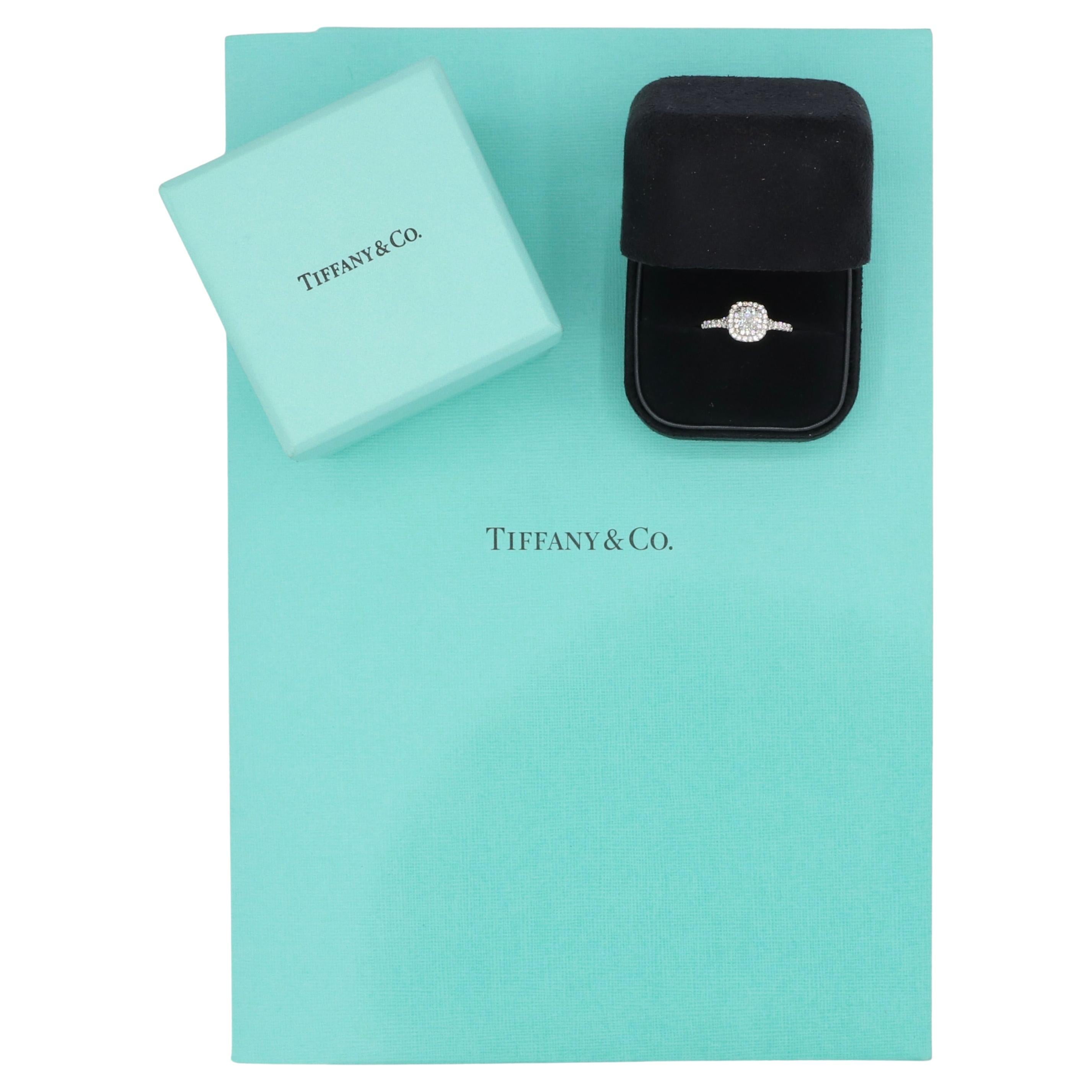 Tiffany & Co. Soleste 0.36 carat G VS1 Cushion Natural Diamond Halo Engagement Ring
Metal: Platinum
Weight: 4.34 grams
Diamond: 0.36 carat cushion G VS1 natural diamond
Accent diamonds: 0.21 CTW D-F VS1 natural round diamonds
Size: 5.5 (US)
Top: