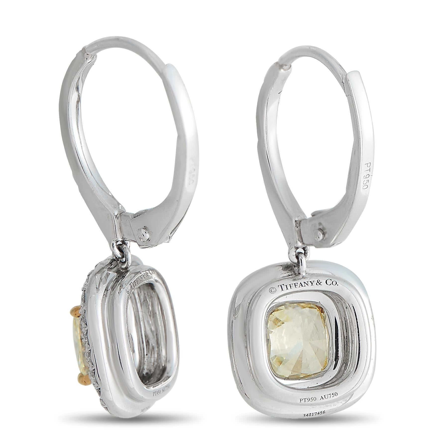 These Tiffany & Co. Soleste earrings will always make a scintillating statement. At the center of the sophisticated 18K White Gold setting, cushion-cut Fancy Yellow Diamonds add a pop of color to the elegant design. Each one measures 0.85” long and