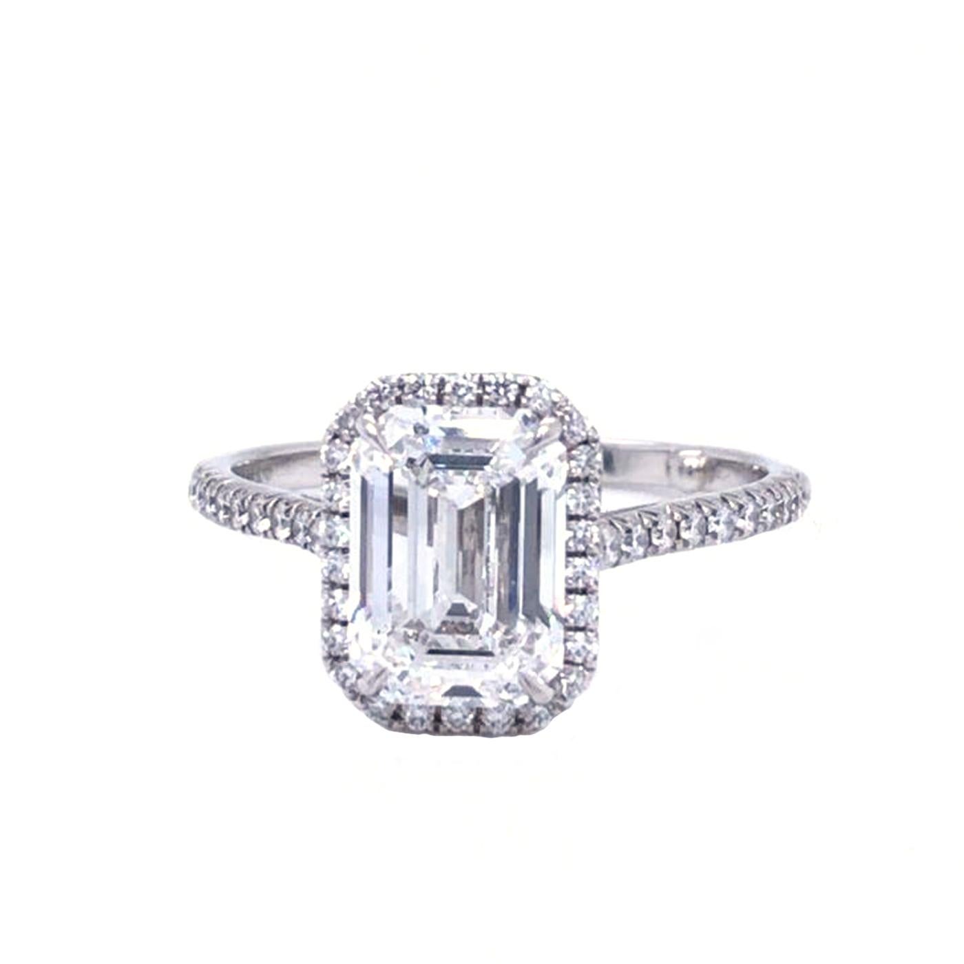 Tiffany & Co. Solitaire  2.63ct Emerald-cut Halo Diamond Platinum Engagement Ring Band

About:
One Tiffany & Co. platinum and diamond solitaire Tiffany Soleste ring, prong set with one emerald cut diamond weighing 2.63 carats, E color, VS1 clarity,