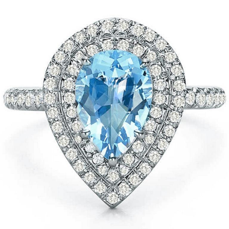 Made of platinum, this ring is set with a pear shaped aquamarine that weighs 2.50ct. The center stone is accentuated by high quality round cut diamond that weigh approx 0.65ct graded D-E color with VS clarity.
It is currently size 5 3/4, and can