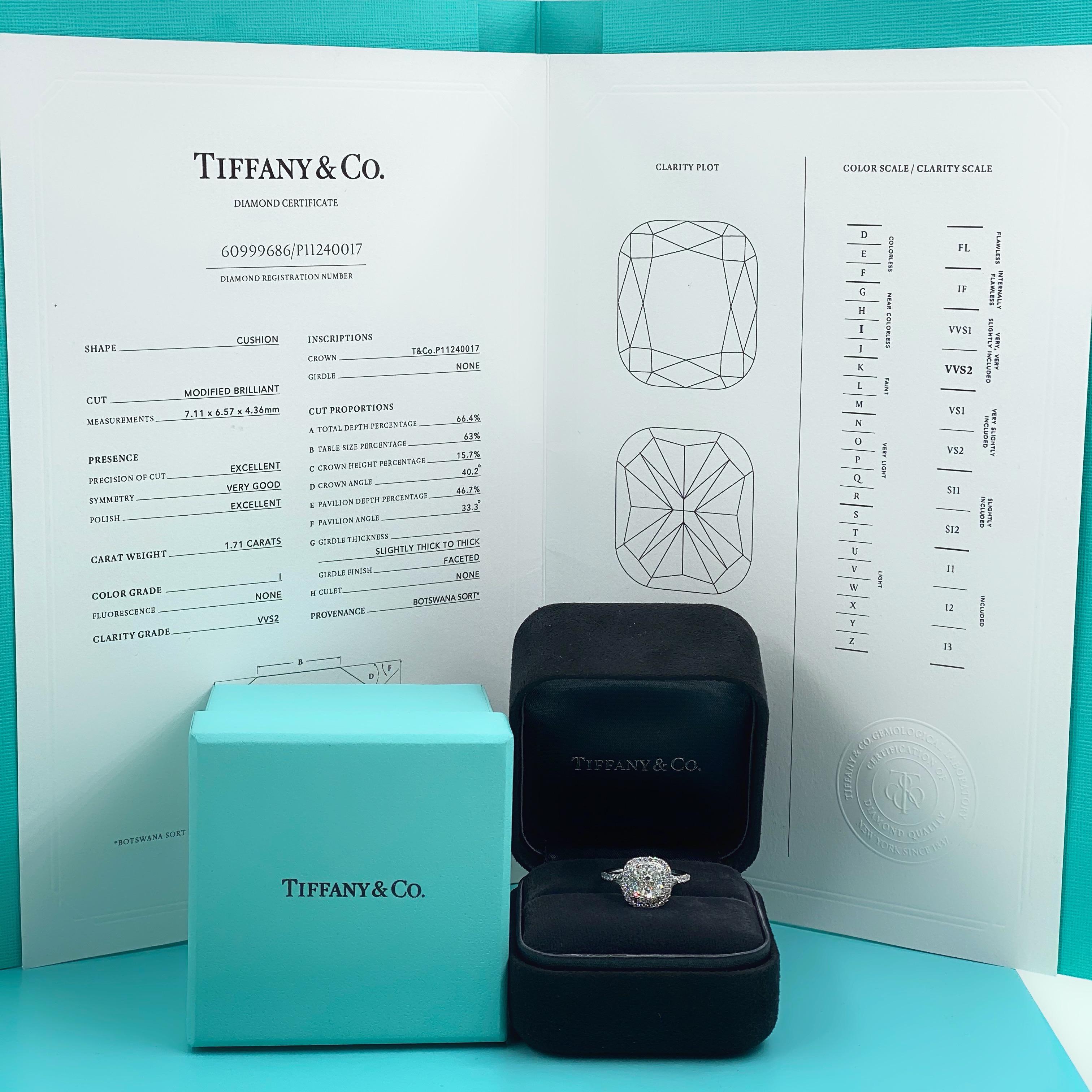 Tiffany & Co

Style:  Soleste Double Halo Engagement Ring
Metal:  Platinum PT950
TCW:  1.71 tcw
Main Diamond:  Cushion Modified Brilliant Diamond 1.71 cts 
Color & Clarity:  I - VVS2
Accent Diamonds:  80 Round Brilliant Cuts 0.50 tcw
Hallmark: 