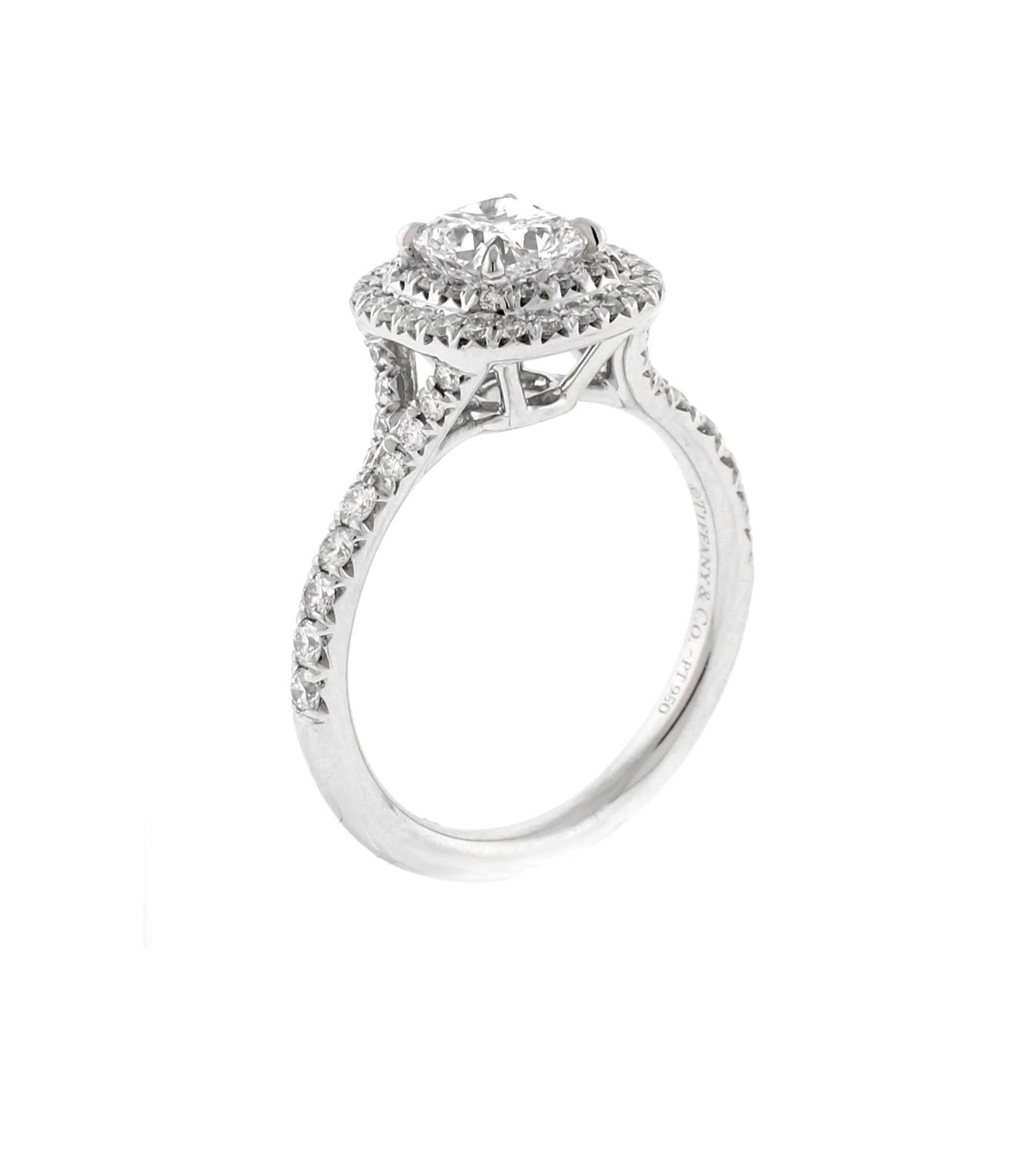 Just as the sun’s rays radiate outward, casting light in every direction, so too does the Tiffany platinum Soleste® engagement ring. With a scintillating double halo of brilliant diamonds and a striking cushion-cut center stone, light is gathered
