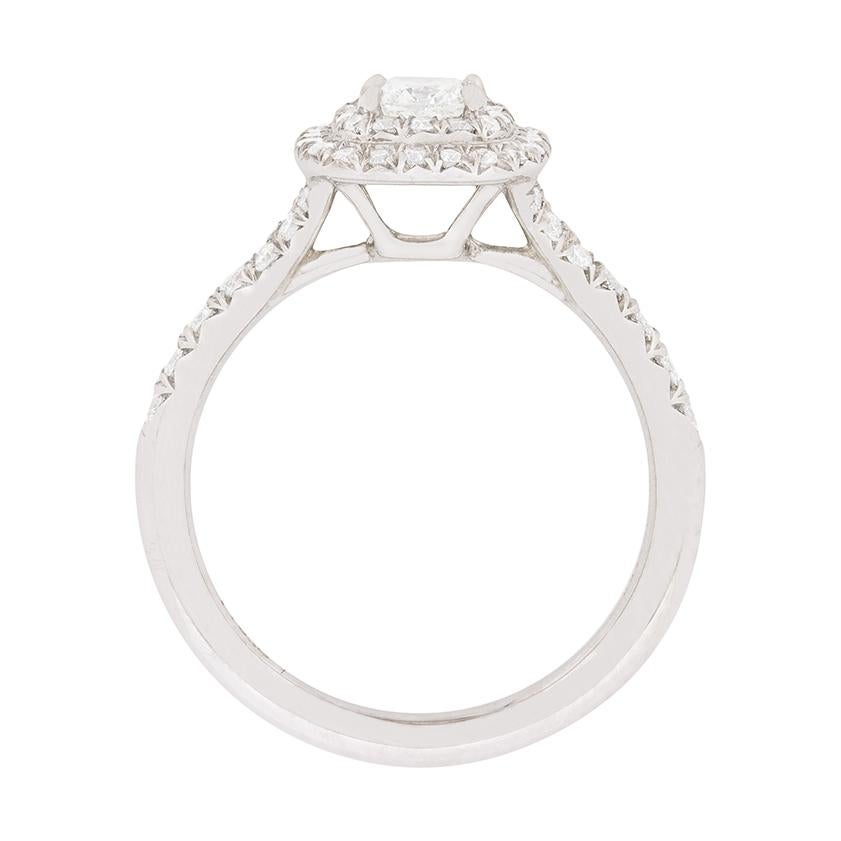 From the Soleste collection at Tiffany & Co, this double halo diamond engagement ring is top quality. The centre cushion cut diamond weighs 0.30 carat and has been graded by Tiffany & Co as an I in colour and IF in clarity. IF is internally flawless