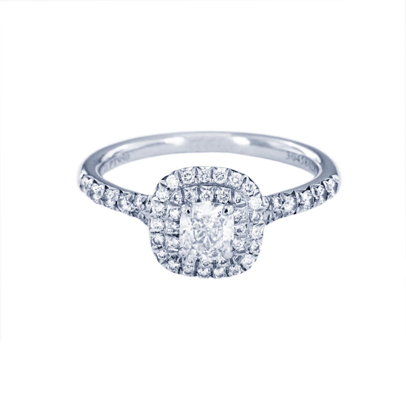 TIFFANY & CO. SOLESTE DOUBLE ROW RING IN PLATINUM

Condition: Mint 
Metal: Platinum
Ring size: 4.75
Center stone: cushion cut, 0.42 carat weight, VVS1 clarity, H color
Side stones: 0.28 carat weight, VS1-VS2 clarity, F-G color
Hallmarks: 