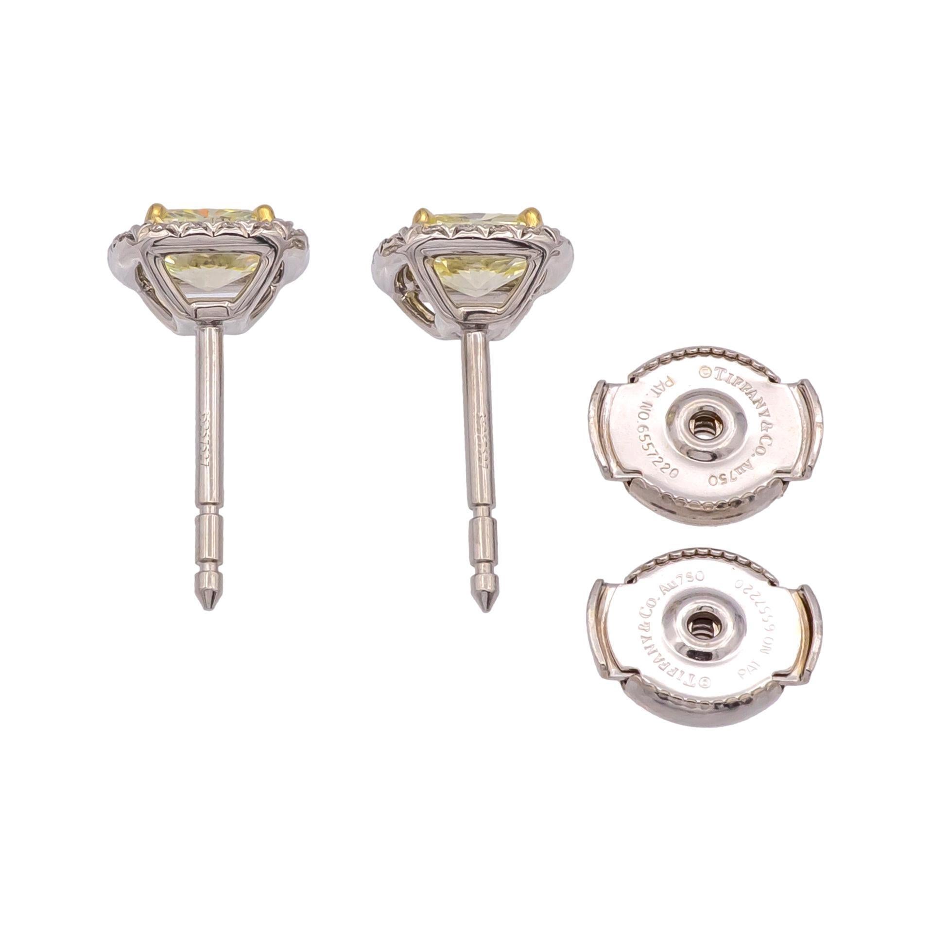 Tiffany & Co. Soleste Fancy Yellow Diamond Halo Stud Earrings in Platinum & 18K In Excellent Condition In New York, NY