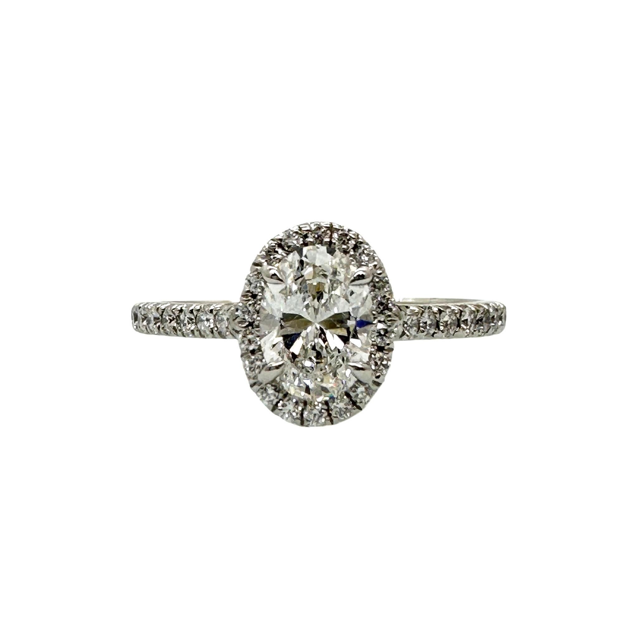 Tiffany & Co. Soleste Oval Diamond 0.60 ct E VS2 Halo Engagement Ring Platinum For Sale 4
