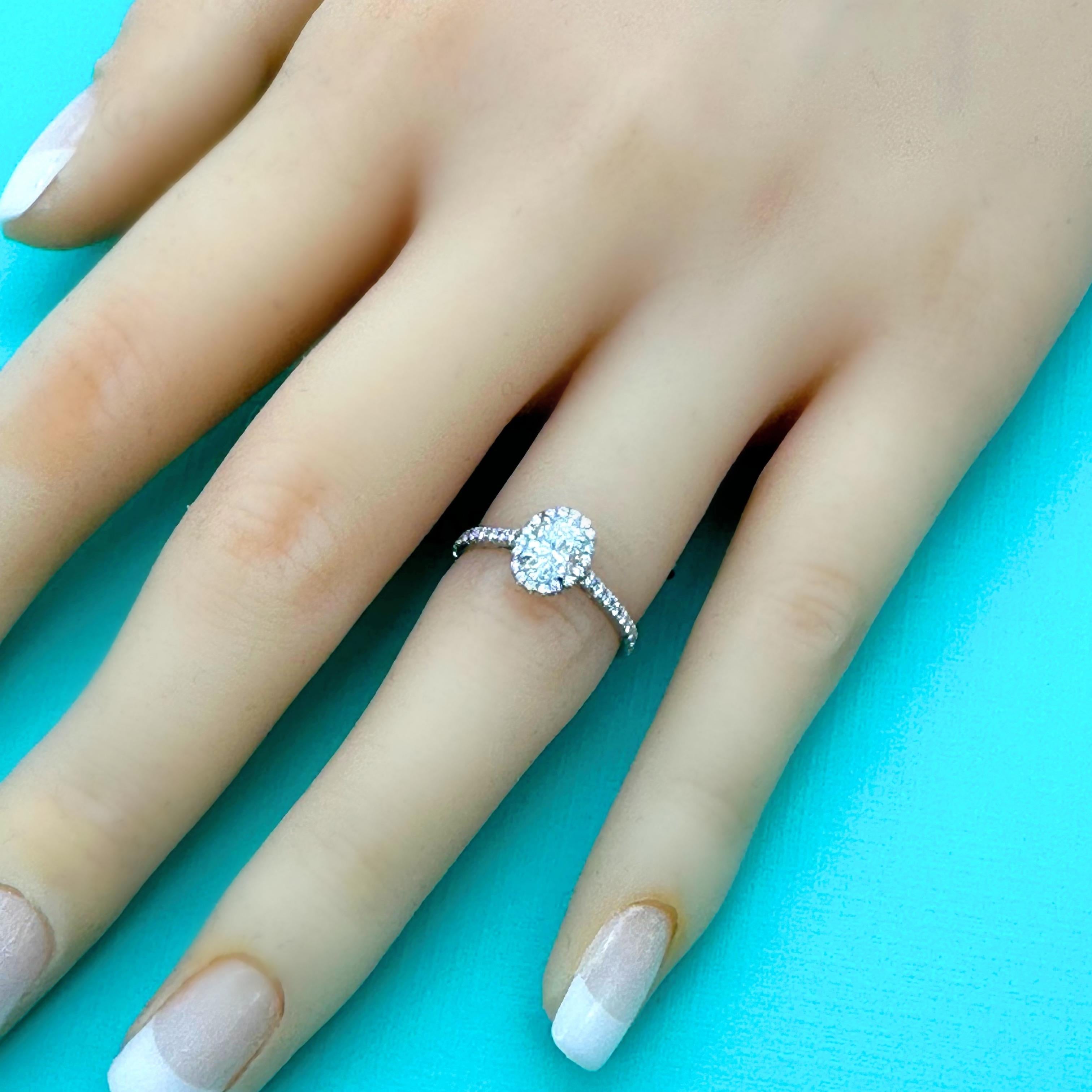 Tiffany & Co. Soleste Oval Diamond 0.60 ct E VS2 Halo Engagement Ring Platinum For Sale 11