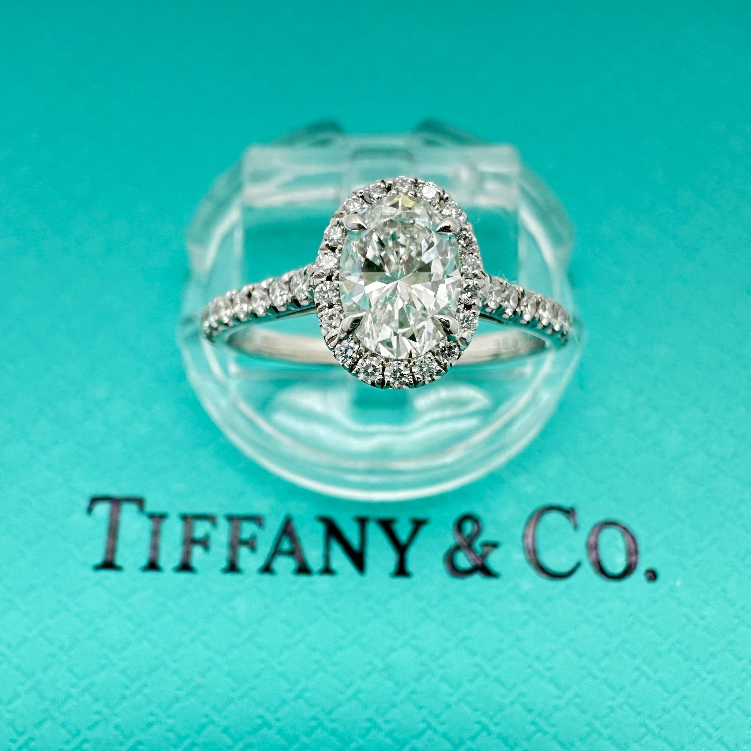 Tiffany & Co. Soleste Oval Diamond Engagement Ring
Style: Soleste Halo with a Diamond Band
Ref. number: 69159958
Certificate:  GIA 1236367637
Metal: Platinum 950
Size / Measurements: 5 - sizable
Main Diamond: 0.60 ct Oval Brilliant
Inscription: 