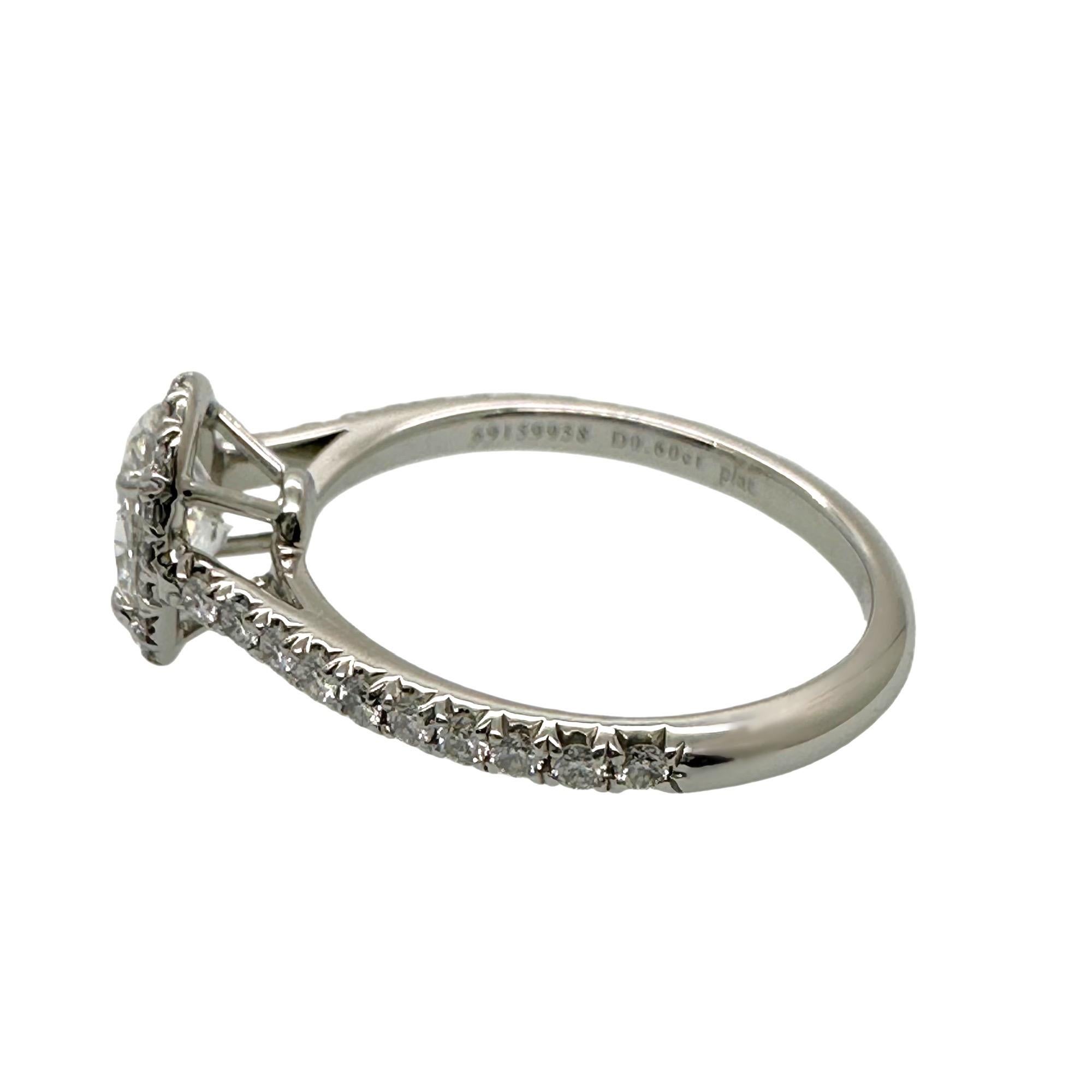 Oval Cut Tiffany & Co. Soleste Oval Diamond 0.60 ct E VS2 Halo Engagement Ring Platinum For Sale