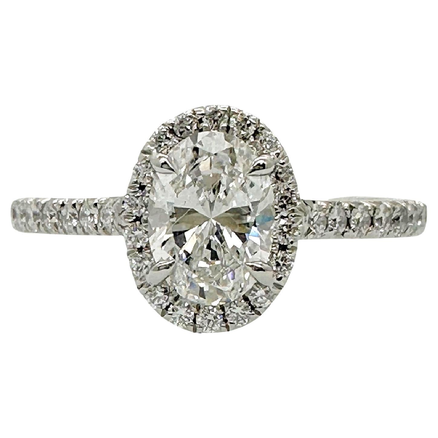 Tiffany & Co. Soleste, bague de fiançailles en platine avec diamant ovale 0,60 ct E VS2 halo