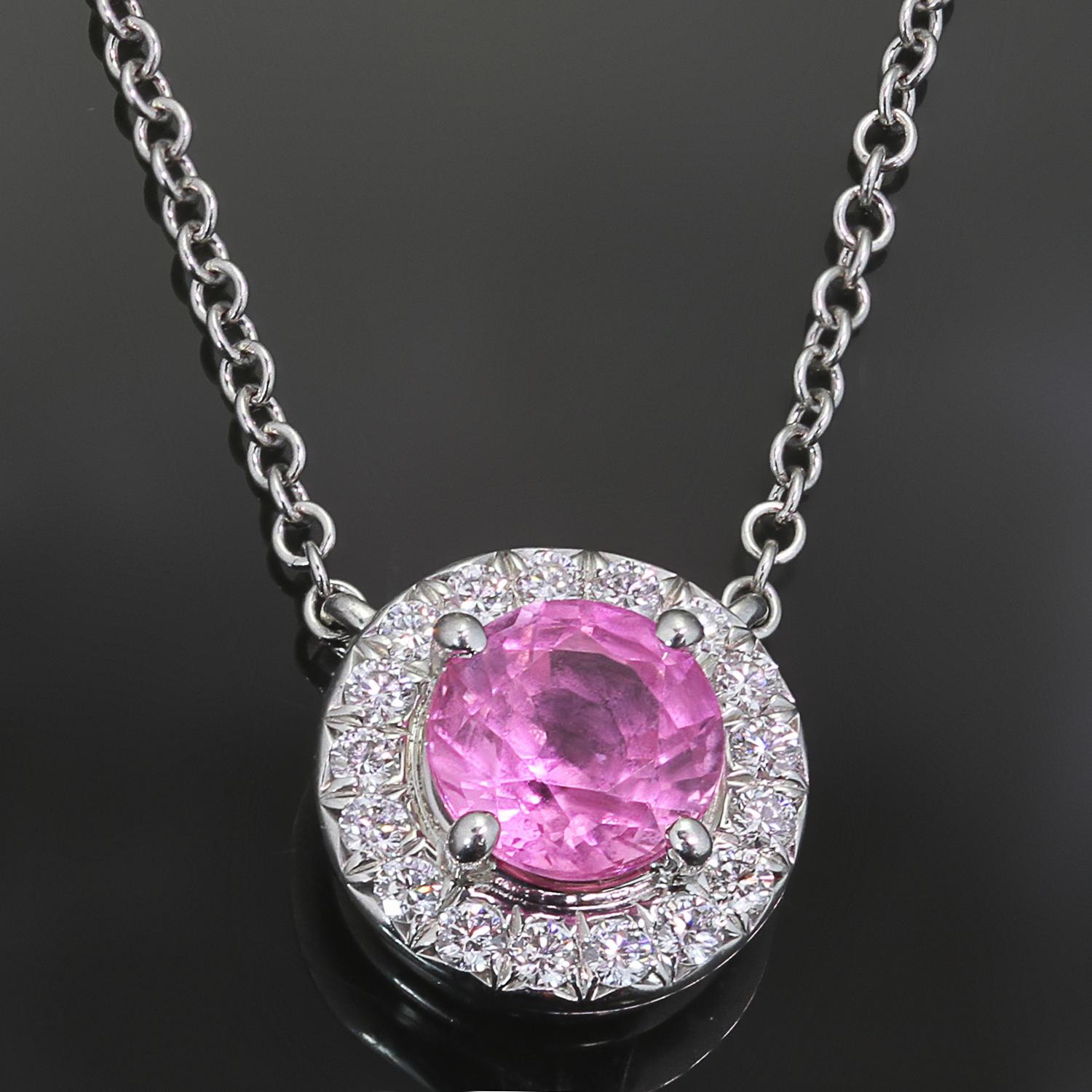 This gorgeous Tiffany & Co. necklace from the sophisticated Soleste collection is crafted in platinum and features a round pendant set with a pink sapphire weighing an estimated 0.40 carats surrounded with brilliant-cut round diamonds weighing an