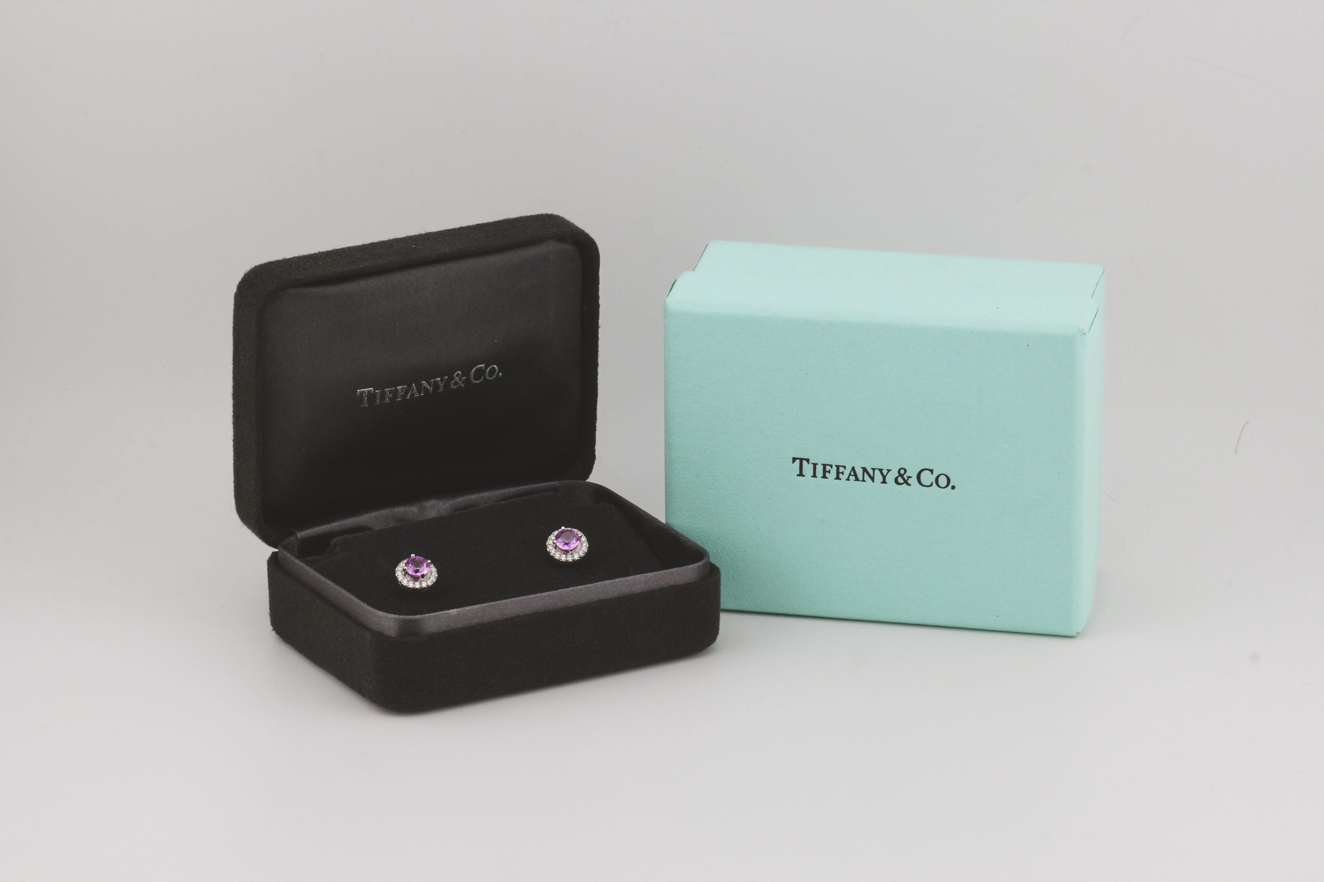 Celebrate color and brilliance with the Tiffany & Co. Soleste Pink Sapphire Diamond Stud Earrings. These breathtaking earrings are a vibrant display of exceptional craftsmanship and timeless elegance, perfect for any occasion.

At the center of each
