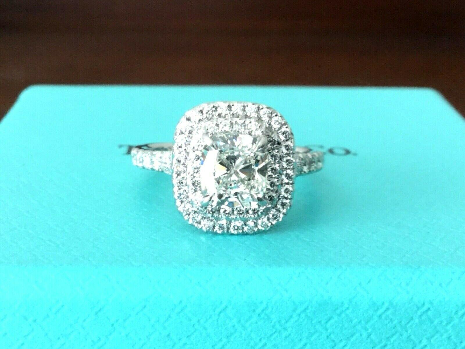 For your consideration is one of the HOTTEST Rings sold at Tiffany's.  The Tiffany Soleste!  This ring is perfect for an engagement ring or ideal as a cocktail ring - either way it is set to impress!

This specific diamond Soleste is special!  It