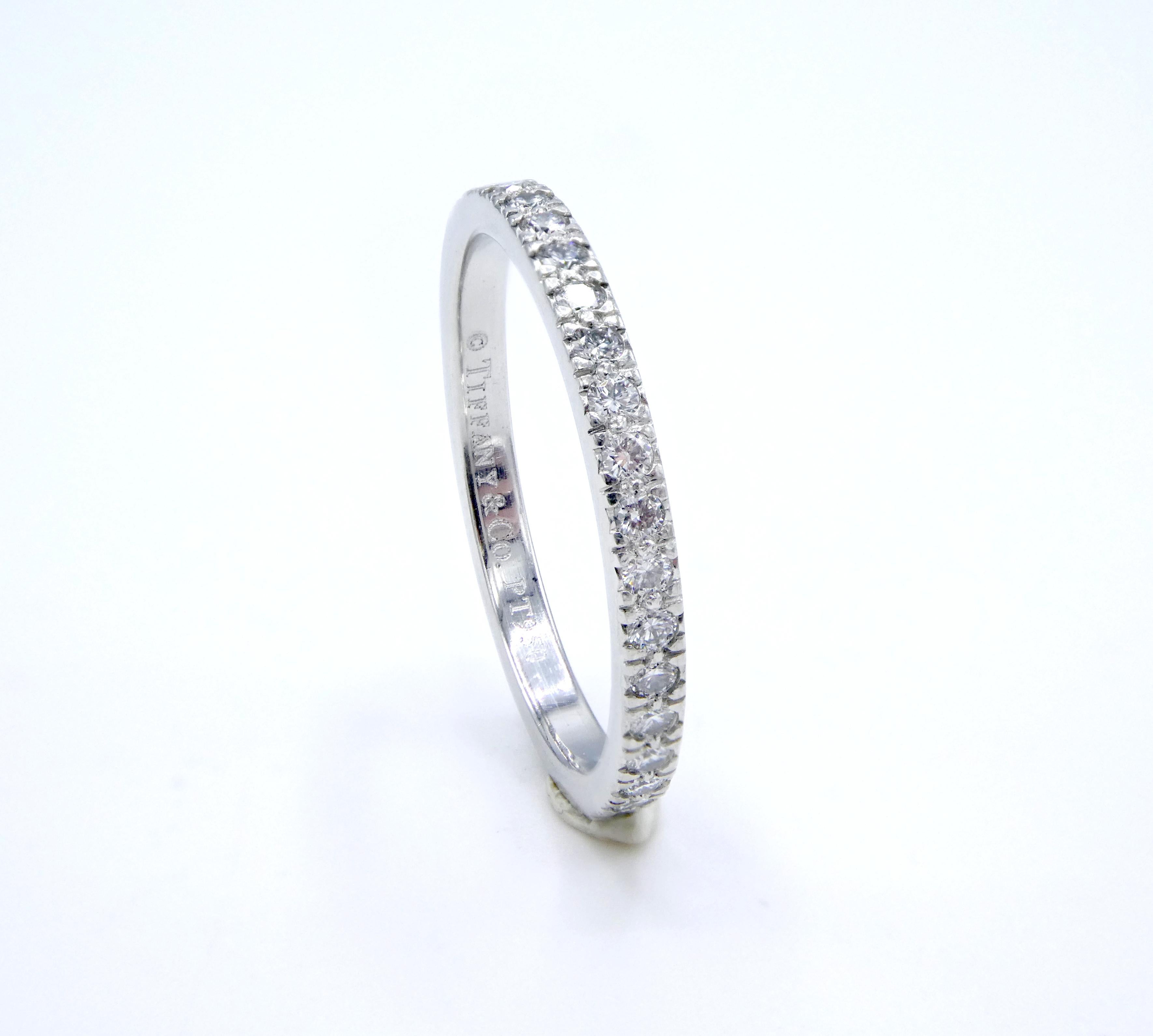 Tiffany & Co. Soleste® Platinum Carat Round Diamond Eternity Band Wedding Ring

Metal: Platinum
Weight: 2.48 grams
Diamonds: 36 round diamonds Approx. 0.34 CTW F-G VS
Size: 6 (US)
Width: 1.90mm
Signed: 