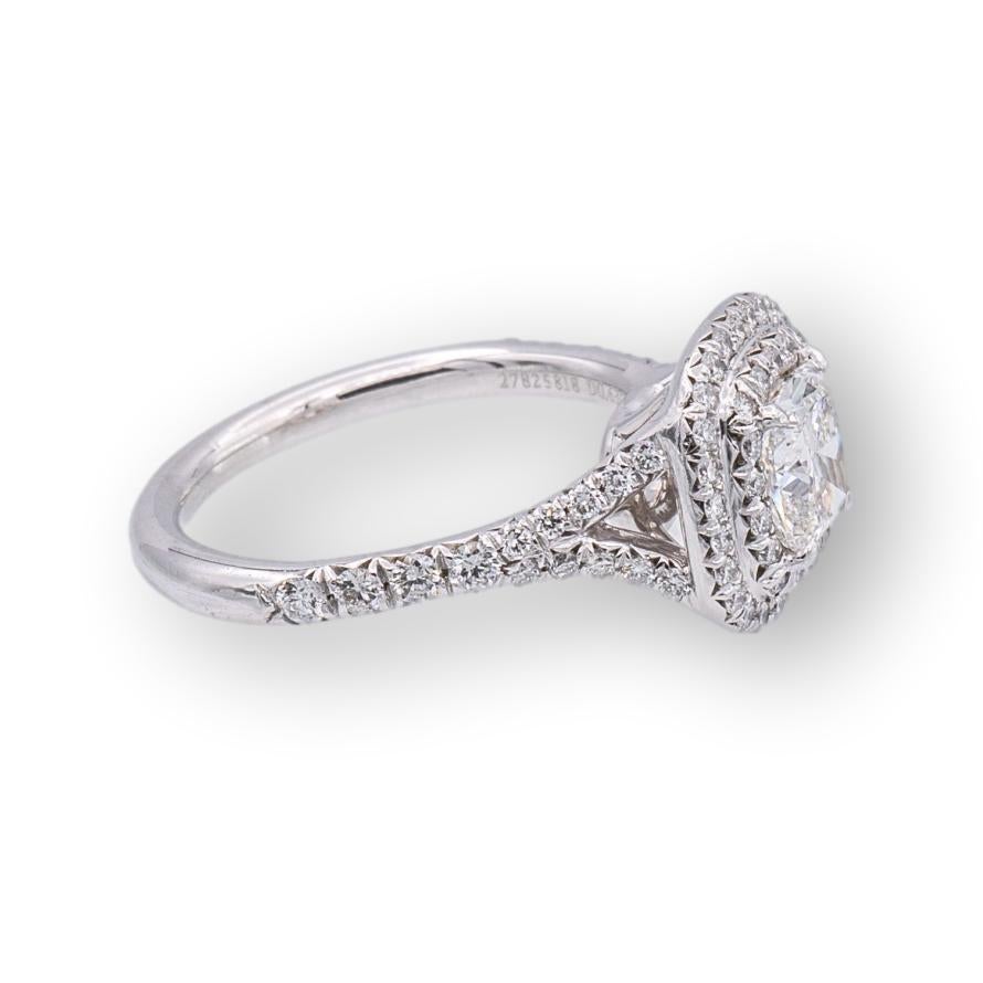 Tiffany & Co. Soleste engagement ring featuring a .63 ct cushion center , H Color, IF (Internally Flawless) clarity finely crafted in platinum, accented by a double row halo design with round brilliant cut bead set diamonds weighing 0.35 carats