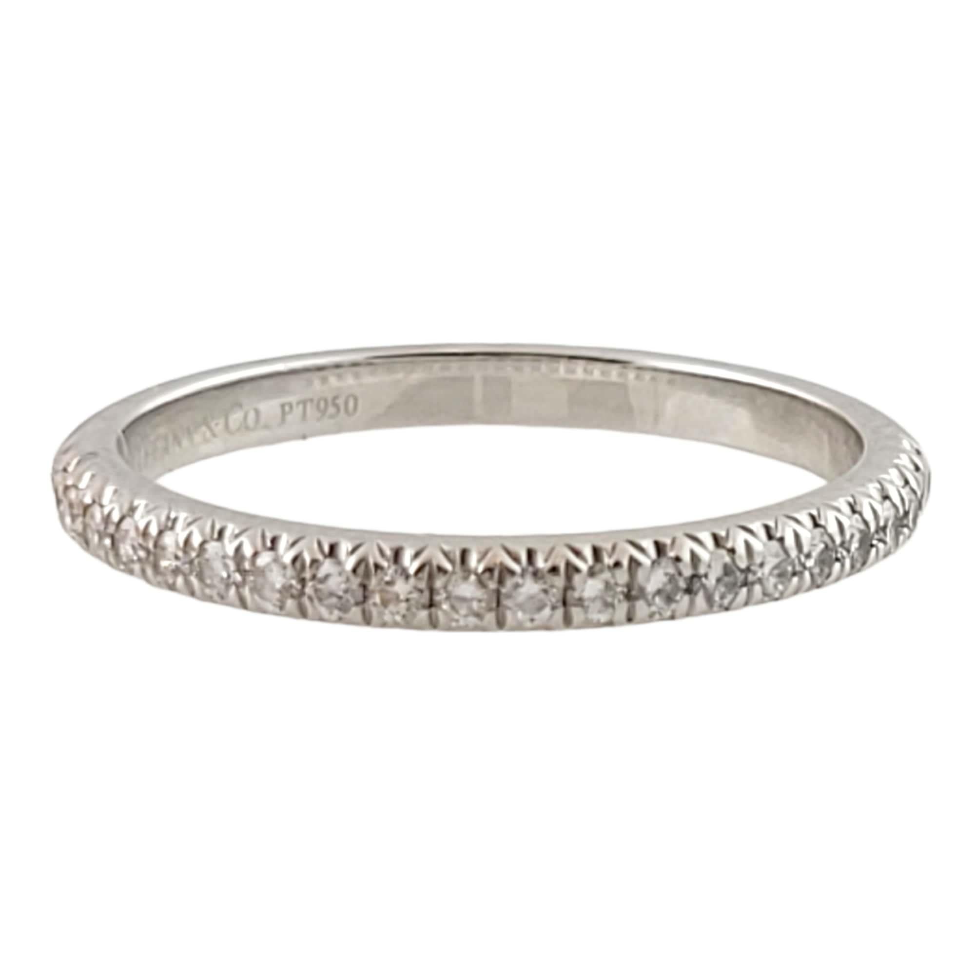 Tiffany & Co. Soleste Platinum Diamond Half Eternity Wedding Band

This classic diamond wedding band is set in platinum and from the Soleste collection by Tiffany & Co. 

Size 6.5

22 round brilliant diamonds are set in this band
Total diamond carat