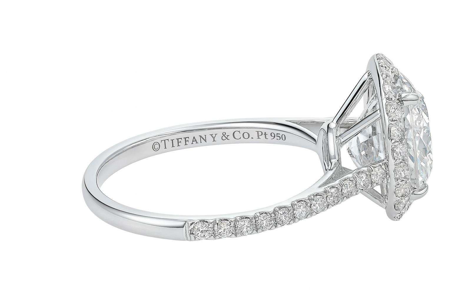 Tiffany & Co. Soleste Platinum Oval Halo Diamond Engagement Ring In Excellent Condition For Sale In Chicago, IL