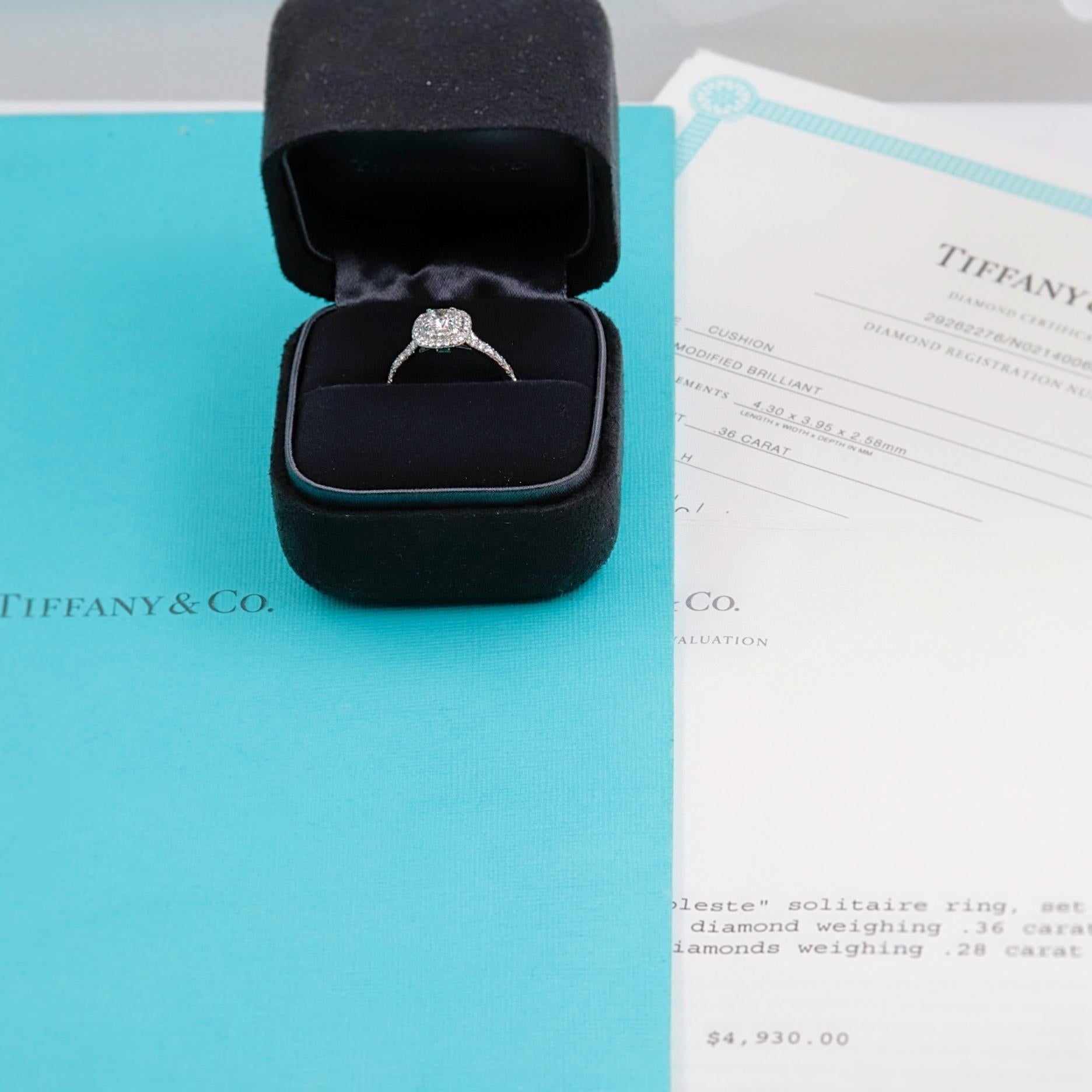 Tiffany & Co.

Style:  Soleste Diamond Engagement Ring
Serial Number:  29262276 / N02140060
Metal:  Platinum PT950
Size:  6 - sizable
Total Carat Weight:  0.64 tcw
Diamond Shape:  Round Brilliant 0.36 cts
Diamond Color & Clarity:  H - VS1
Crown