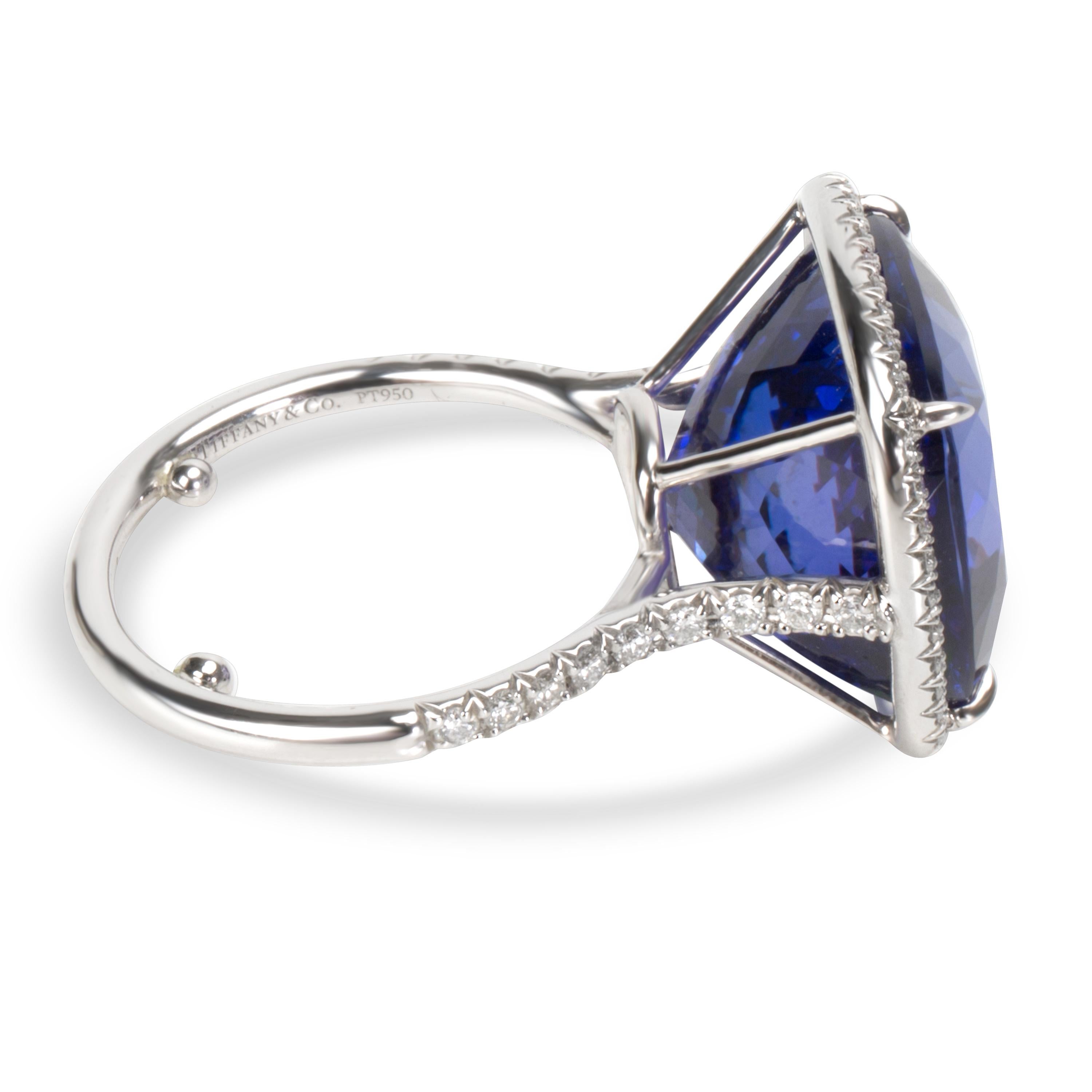 Tiffany & Co. Soleste Tanzanite & Diamond Halo Ring in Platinum 18.14 Carats
	
Retail price 35,000 USD. In excellent condition and recently polished. Comes with original box. Size 5 with sizing beads.

DETAILS

Shape: Cushiom
Carat Weight Center :