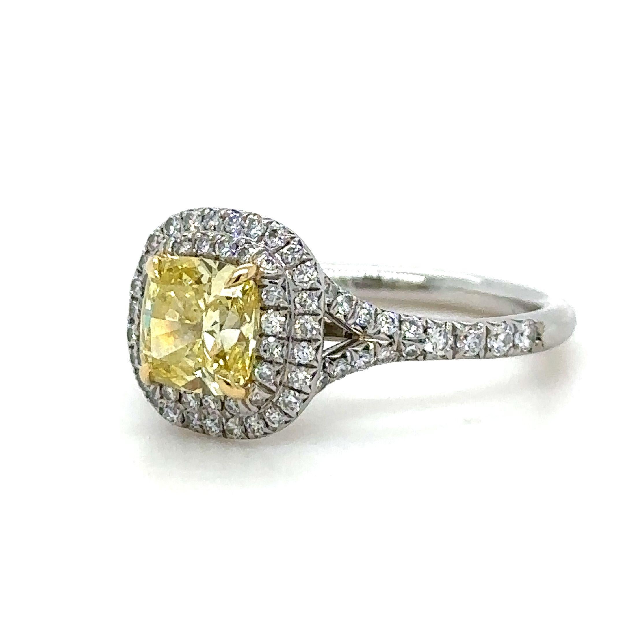 Tiffany Soleste Cushion-cut Fancy Vivid Yellow Diamond Halo Engagement Ring in Platinum with a total carat weight of 1.23ct.

Metal: Platinum PT950
Carat: 1.23ct
Colour: Fancy Vivid Yellow
Clarity: VS2
Cut: Modified Brilliant - Cushion
Weight: 8