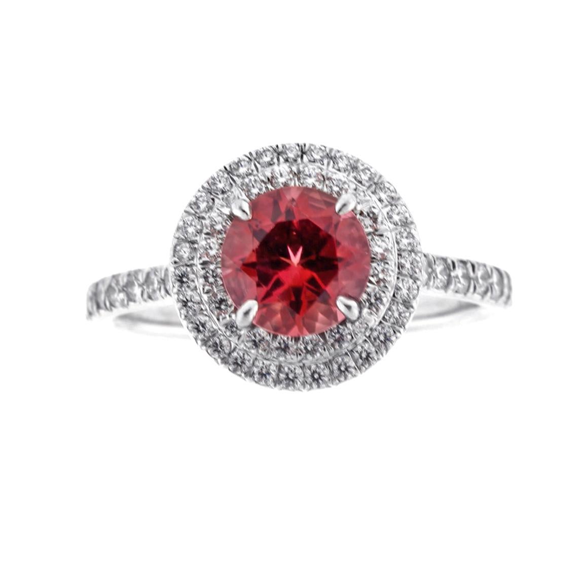 From Tiffany & Co.'s Soleste collection, Shimmering diamonds surround an intensely colored pink Tourmaline.
Platinum ring with a 6.5mm pink Tourmaline  and a double row of round brilliant diamonds. (Medium size)
♦ Designer: Tiffany & Co.
♦ Metal: