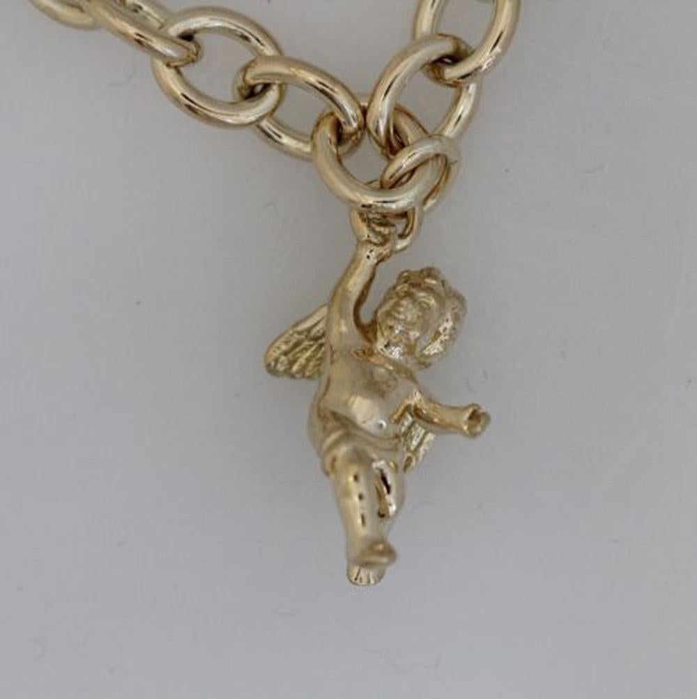 Tiffany and Co. CHERUB Charm 18k Solid Yellow gold , price is only for the charm no necklace.

A Tiffany gold charm tells a story. Cherub charm in 18k gold. 

Apprx 2.5 inches tall by 1.5 inches wide.

Guaranteed Authentic Tiffany & Co

SKU