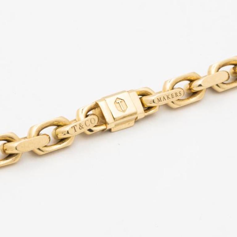 Tiffany & Co. Solid 18k Yellow Gold Link Chain c.1970s

Additional Information:
Maker: Tiffany & Co. 
Model: Link Necklace
Year: 1970s
Material: Solid 18k Yellow Gold
Length: 71.2cm/28 inches 
Weight: 108.4g
Condition: Pristine Vintage