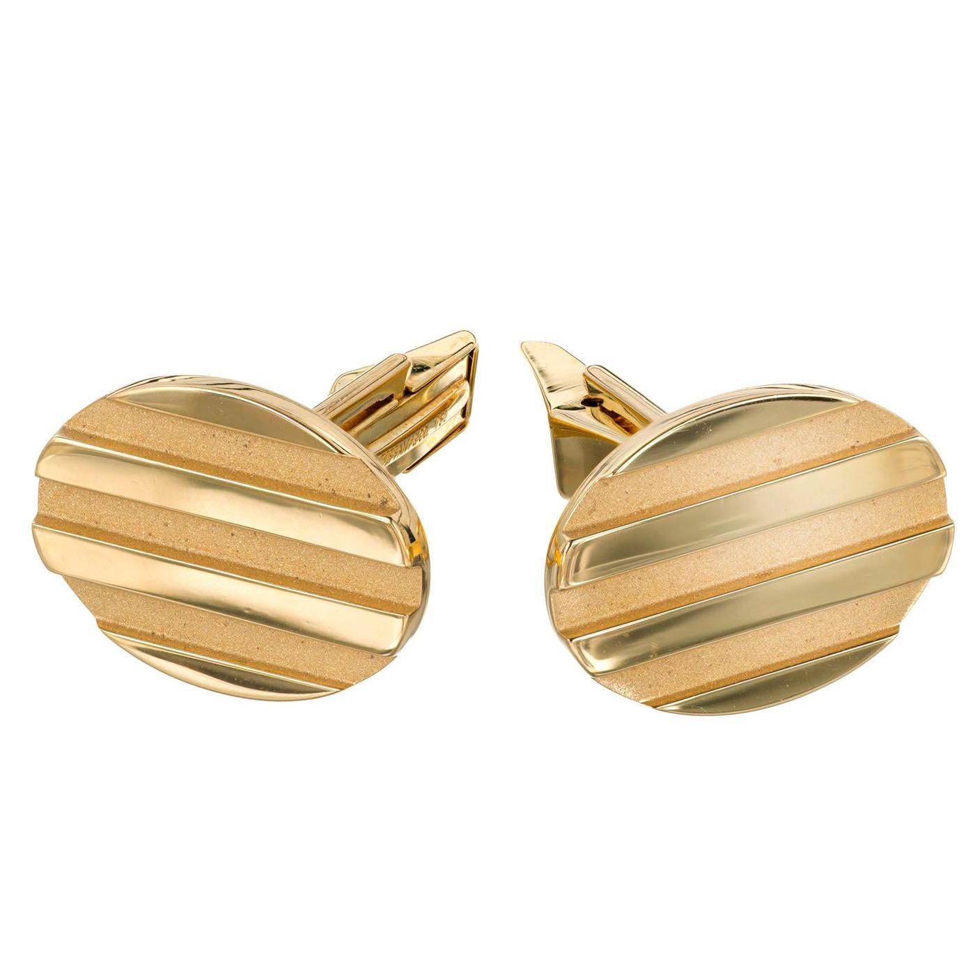 Tiffany & Co. Gemelli da polso lucidi in oro giallo massiccio 18 carati a forma ovale con chiusura a clip