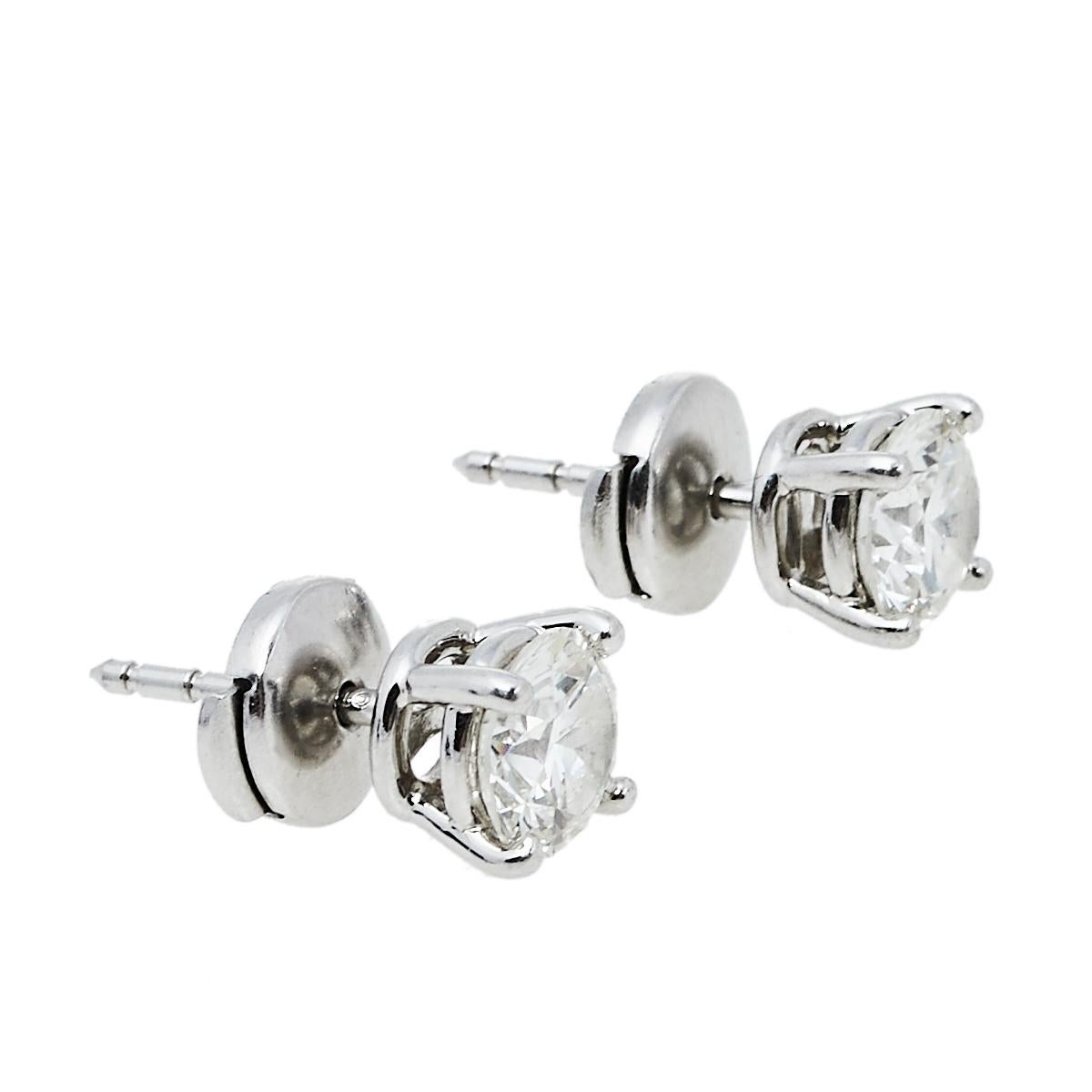 Add this beautiful pair of stud earrings to your Tiffany collection! The pair features solitaire round brilliant-cut diamond studs set in platinum to perfection on 4 prongs. Wear this dazzling pair with your evening attire or formals.

Includes: