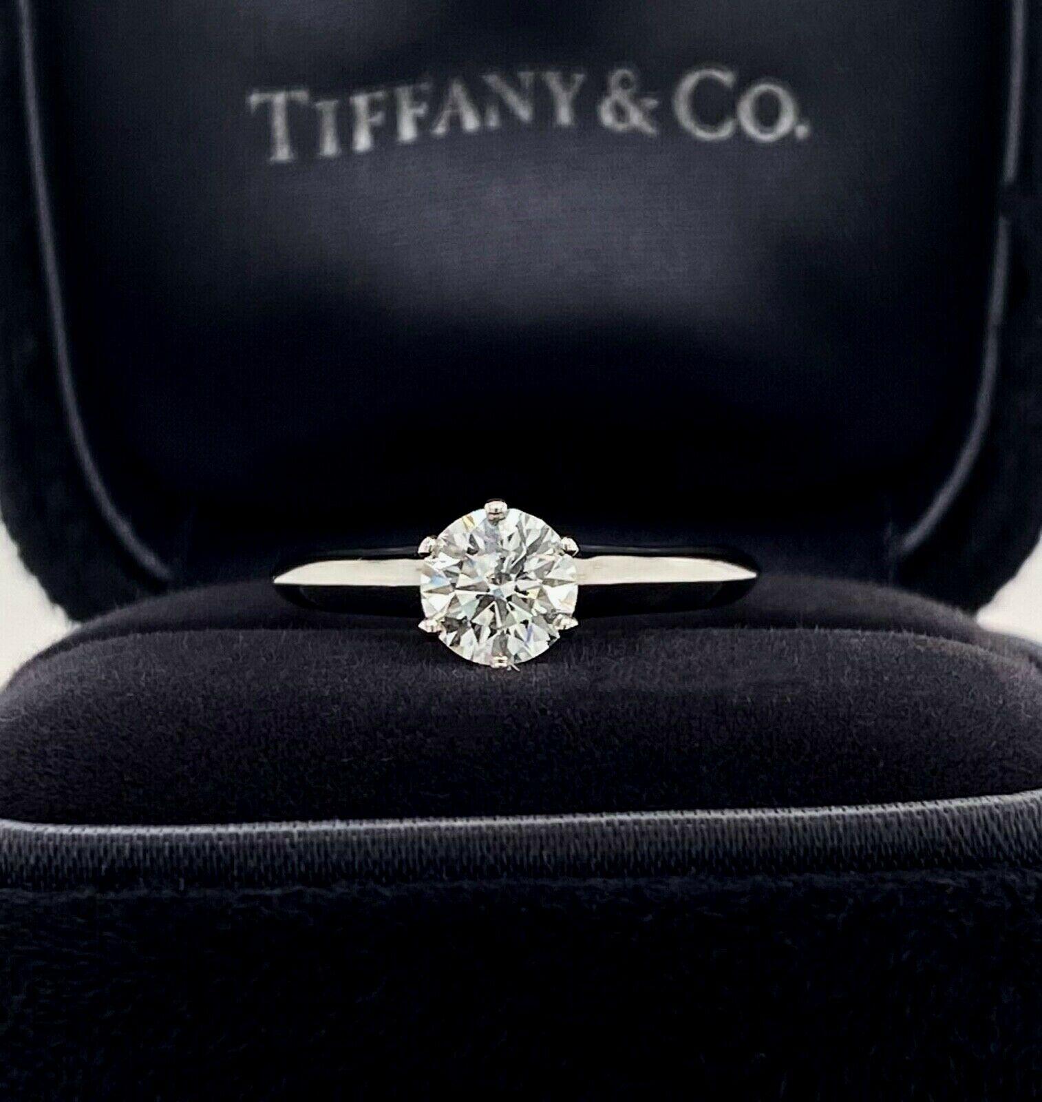 Tiffany & Co Round Brilliant Solitaire Engagement Ring featuring a 0.74 ct Center G color, VVS1 clarity, finely crafted in a 6 prong Platinum Mounting. ( Current Retail for $9,300 )
Includes Original Tiffany certificate and Box. 

Stamped: Tiffany &