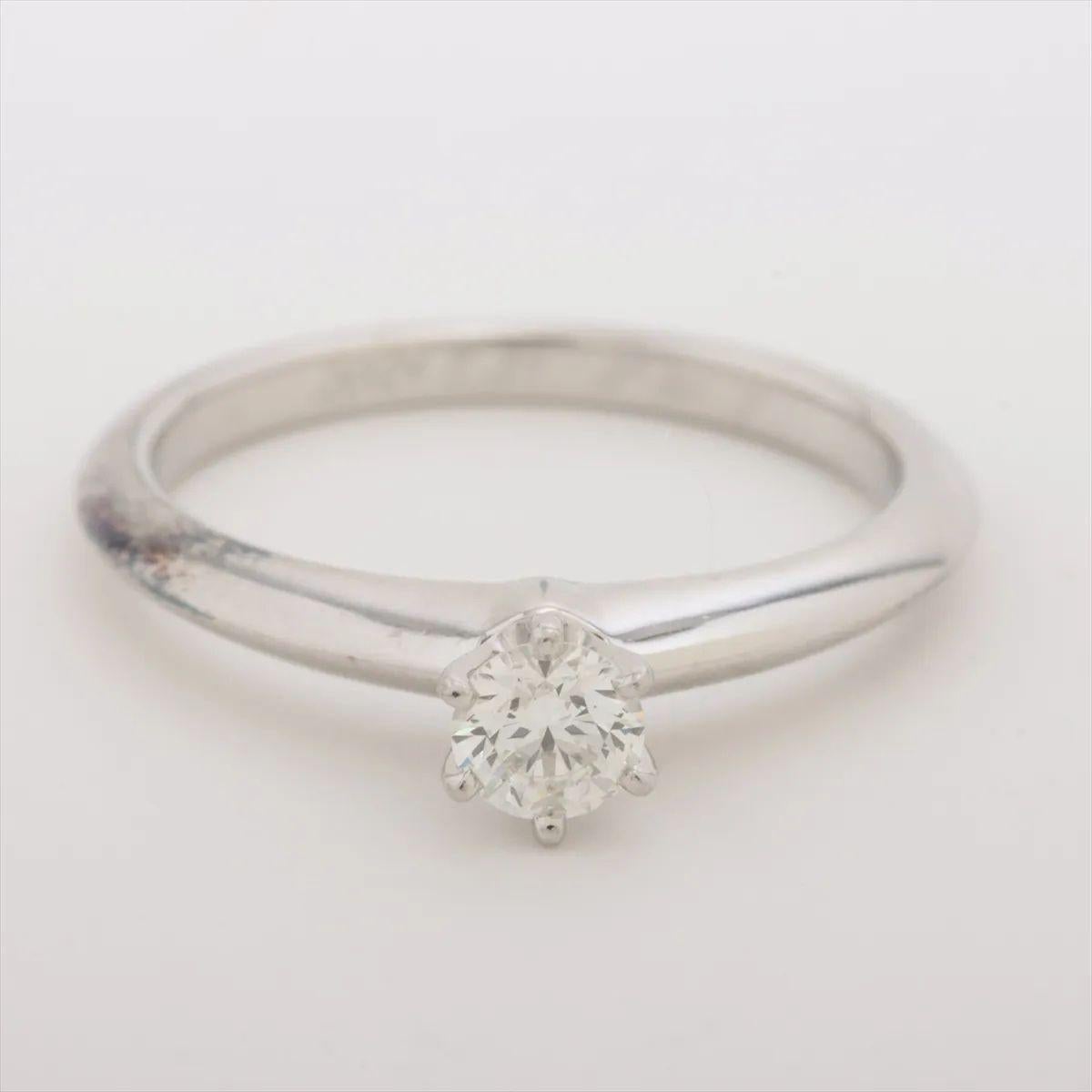 The Tiffany & Co. Solitaire Diamond Ring in platinum is a quintessential symbol of timeless elegance and enduring love. Featuring a single, brilliant-cut diamond, the ring is expertly crafted to highlight the stone’s exceptional fire and clarity.