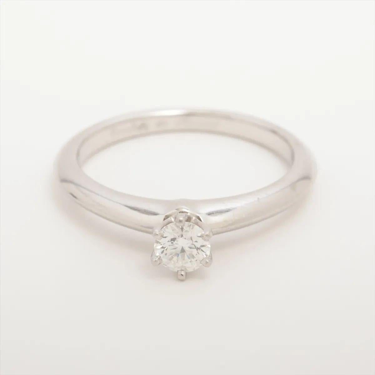 The Tiffany & Co. Solitaire Diamond Ring in platinum is a quintessential symbol of timeless elegance and enduring love. Featuring a single, brilliant-cut diamond, the ring is expertly crafted to highlight the stone’s exceptional fire and clarity.