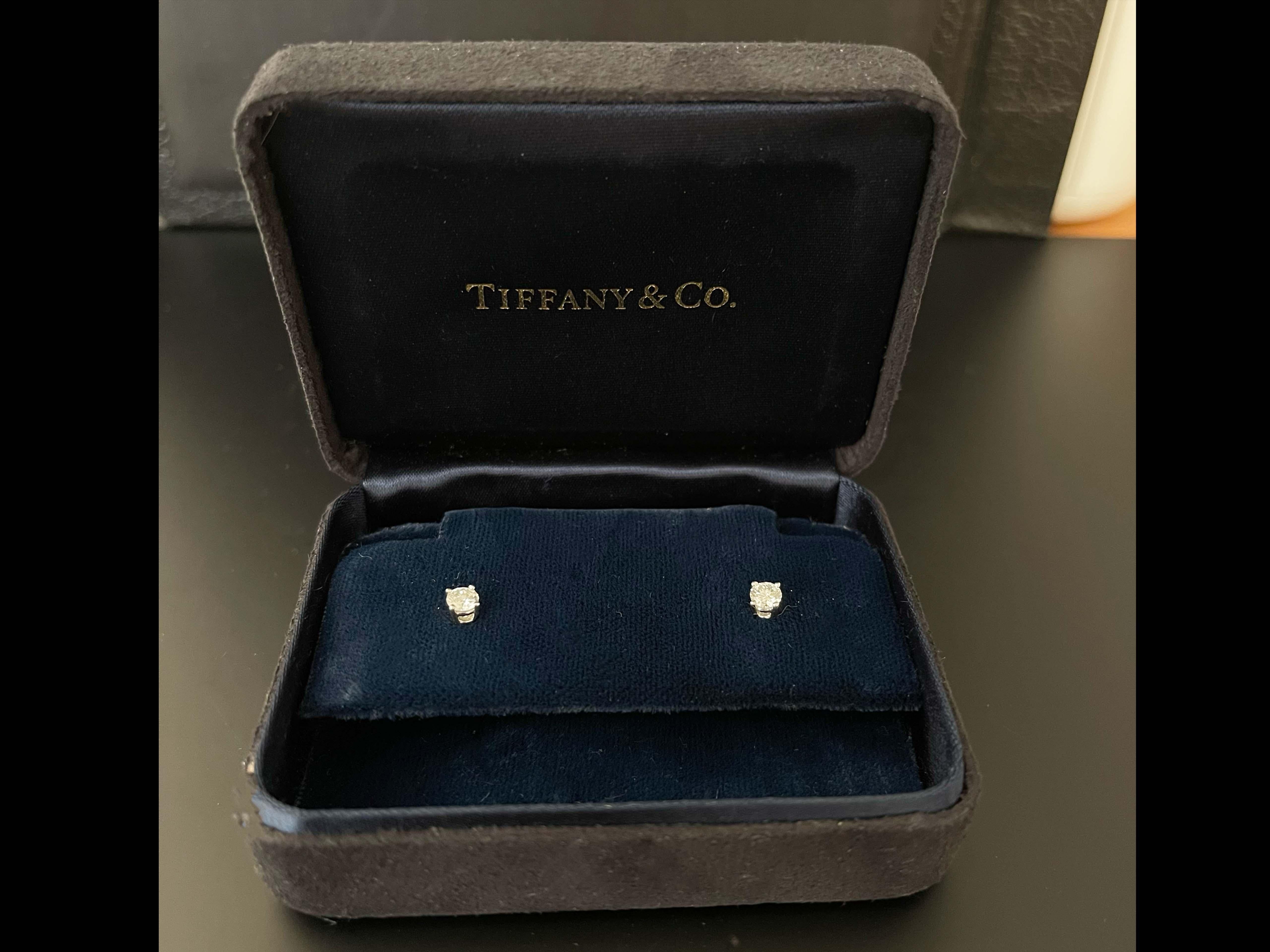 tiffany solitaire diamond stud earrings in platinum