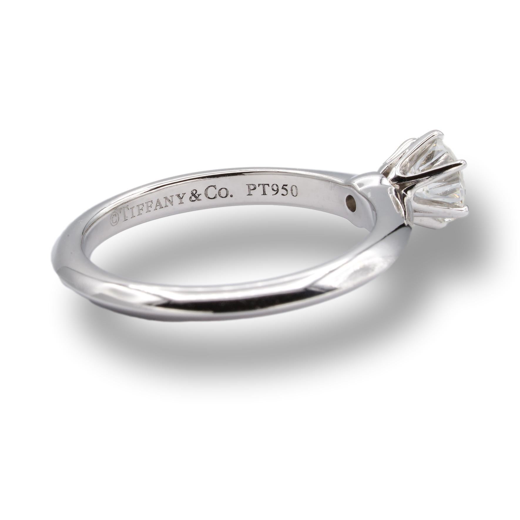 Tiffany & Co Round Brilliant Solitaire Engagement Ring featuring a 0.53 ct Center H color, VVS1 clarity, finely crafted in a 6 prong Platinum Mounting. ( Current Retail for $5,600)This diamond Includes a GIA certificate with report number 2215486409