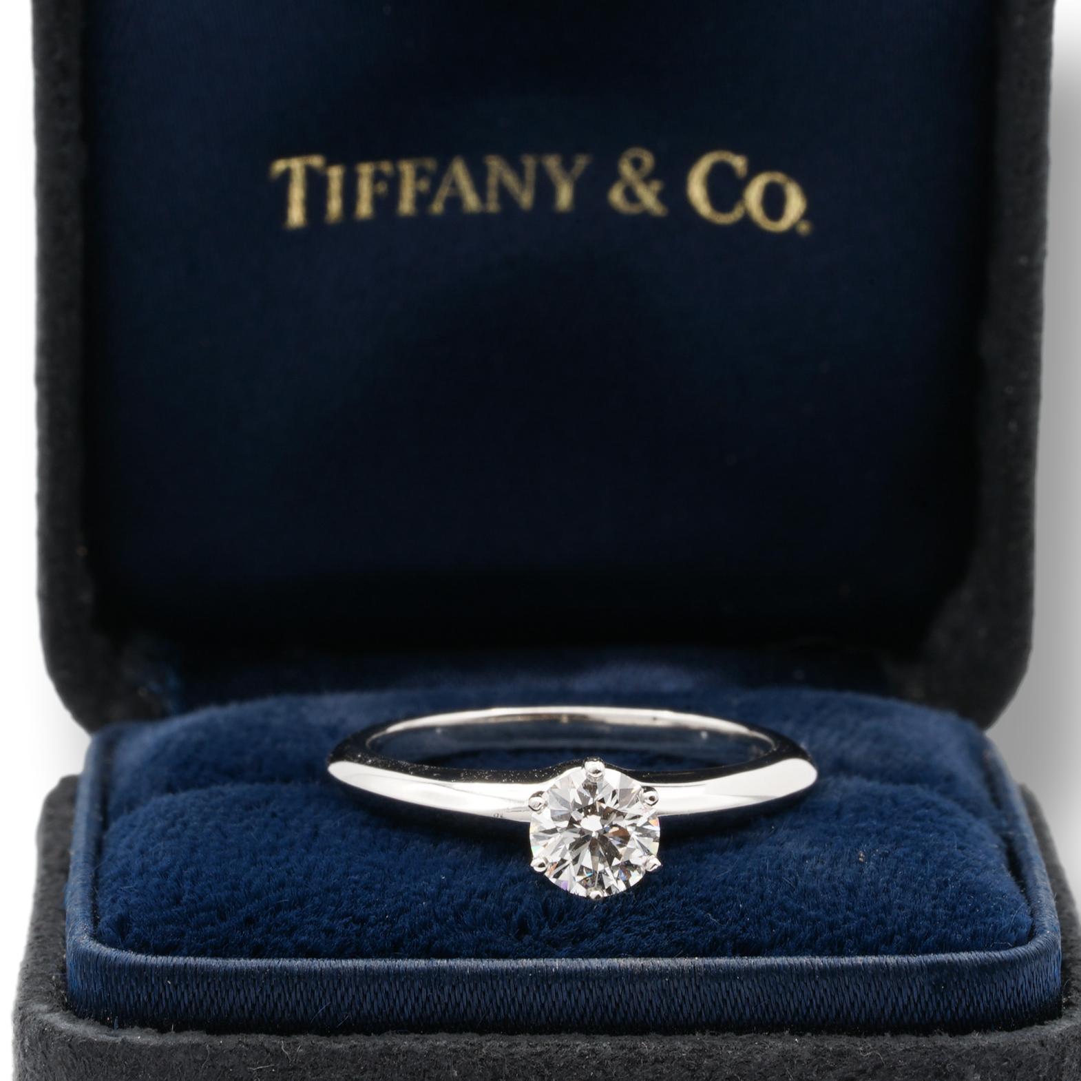 Tiffany & Co Round Brilliant Solitaire Engagement Ring featuring a 0.53 ct Center I color, VS1 clarity, finely crafted in a 6 prong Platinum Mounting. ( Current Retail for $6,300)
Includes Original Tiffany certificate and Box. 

Stamped: Tiffany &