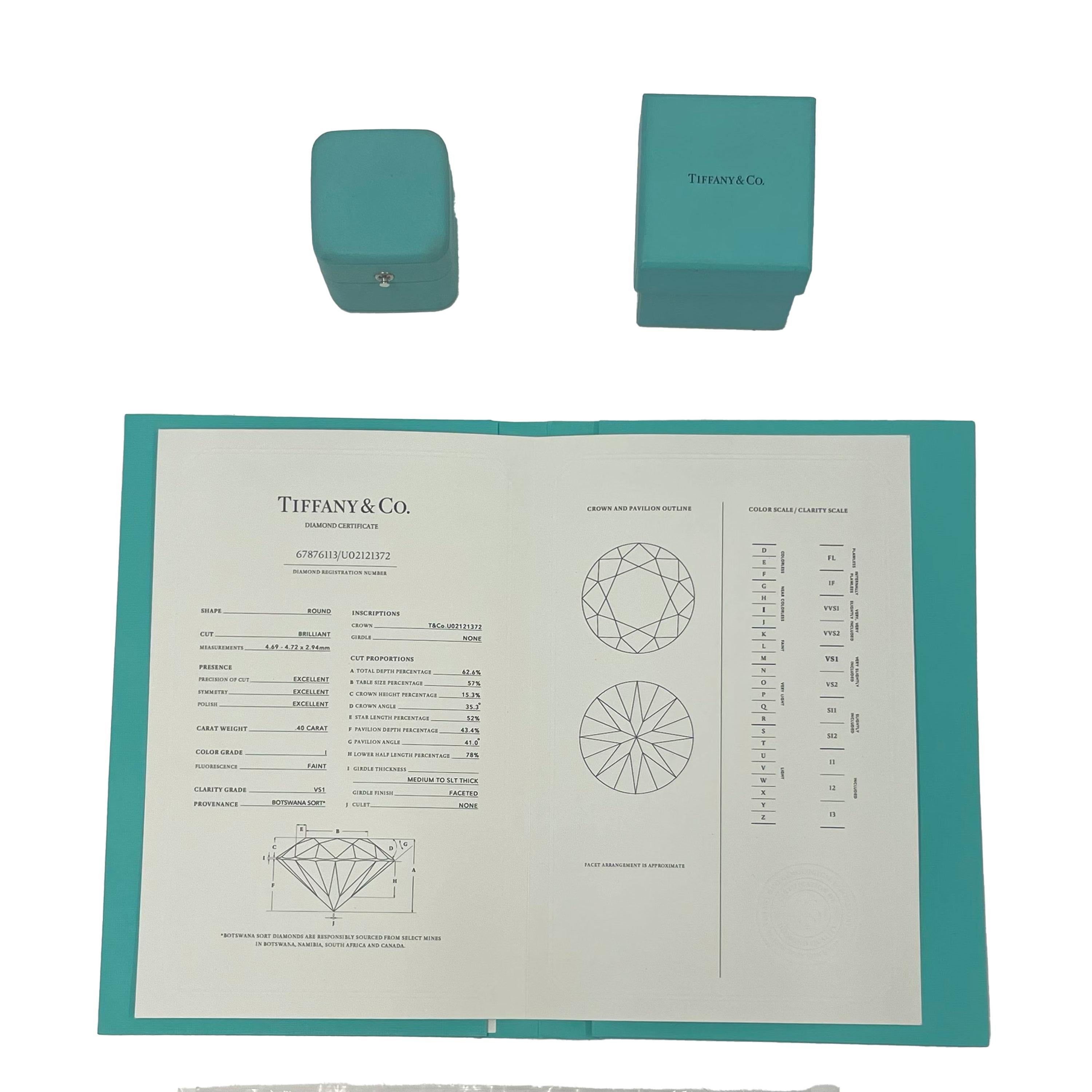 Tiffany & Co. Solitaire Engagement Ring In Platinum .40 CTW. For Sale 1