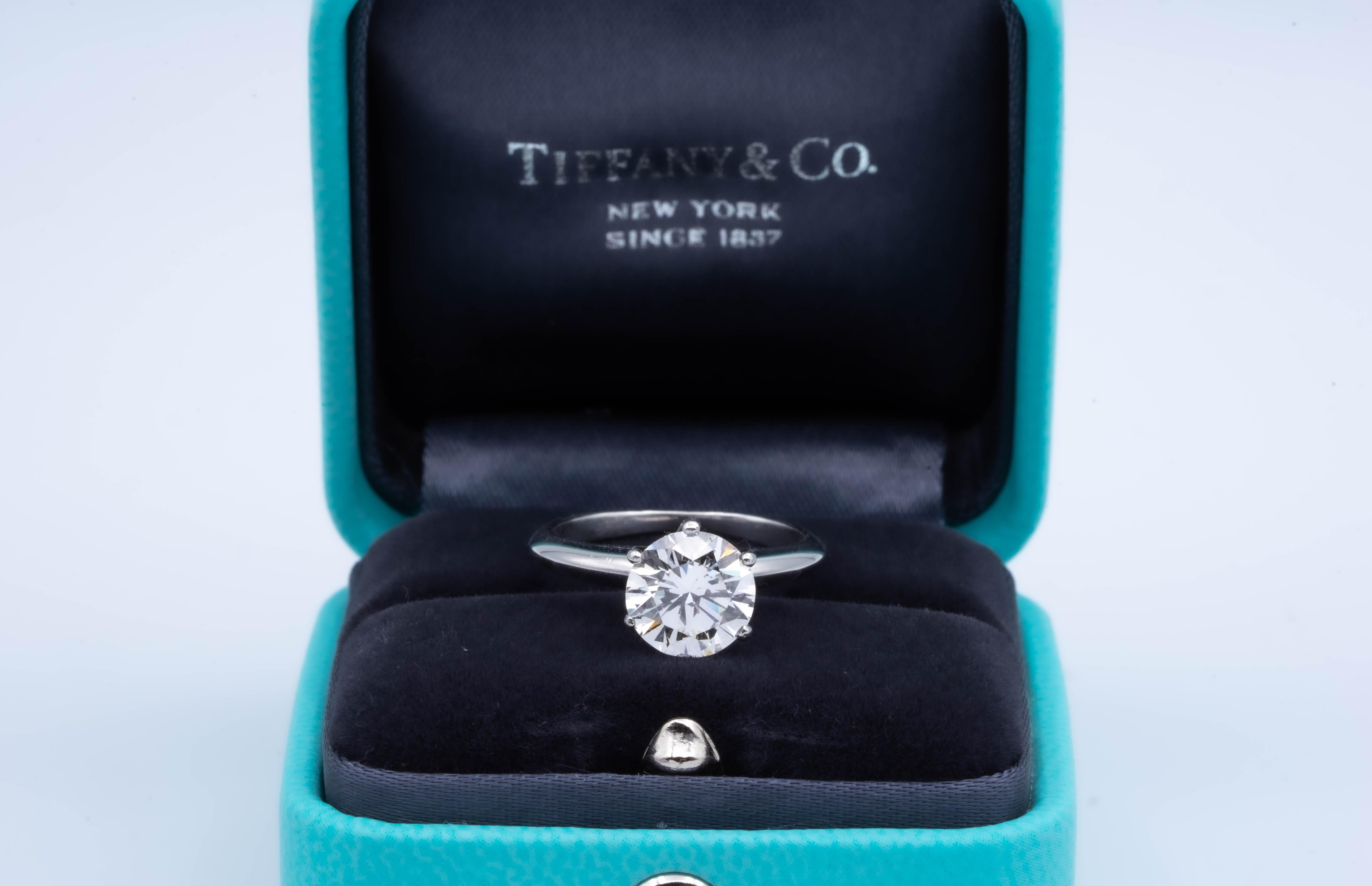Vintage Tiffany & Co Round Brilliant Solitaire Engagement Ring featuring a 1.64 ct Center I  color, VS2 clarity, finely crafted in a 6 prong Platinum Mounting. This diamond Includes a GIA certificate with report number 10091237 and a grading of I