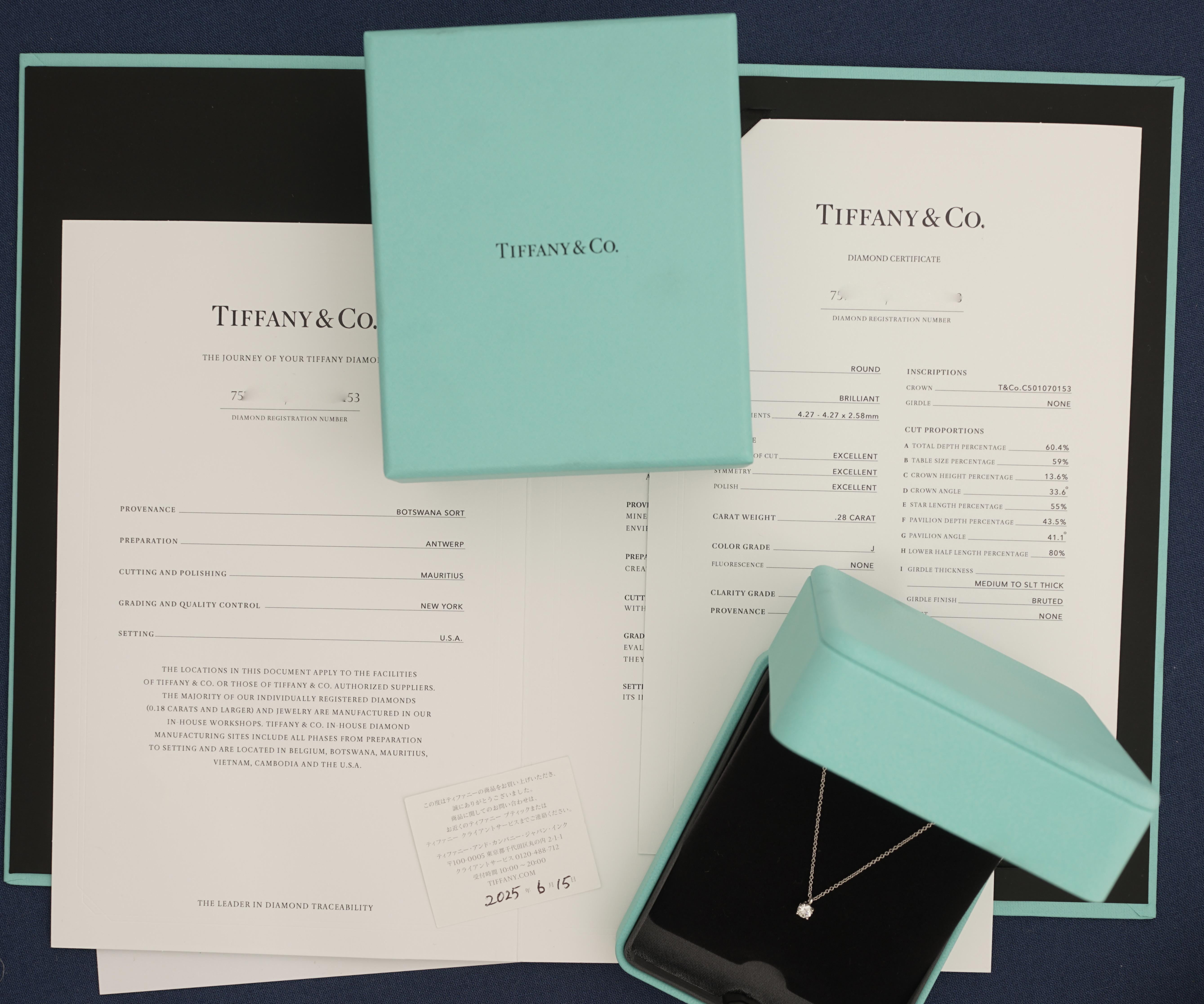 Tiffany & Co, Solitaire Diamond Necklace,
Round Brilliant Cut
Tiffany certified 0,28 Carat, J Color and VS1 Clarity and Triple X quality.
Mounted in Platinum 950/1000 with Tiffany & co Platinum chain.
Signed Tiffany & Co, and numbered. 
Comes with