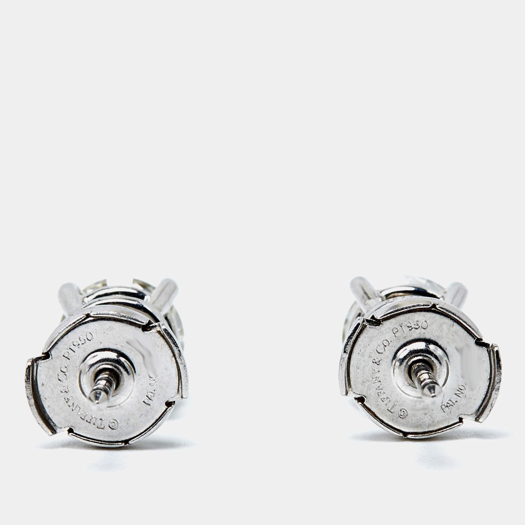 One look at this wondrous pair from Cartier, and our hearts flutter. The authentic diamond studs are created from platinum to make you bloom in luxury.

Includes: Original Case, Tiffany & Co. Diamond Certificates

