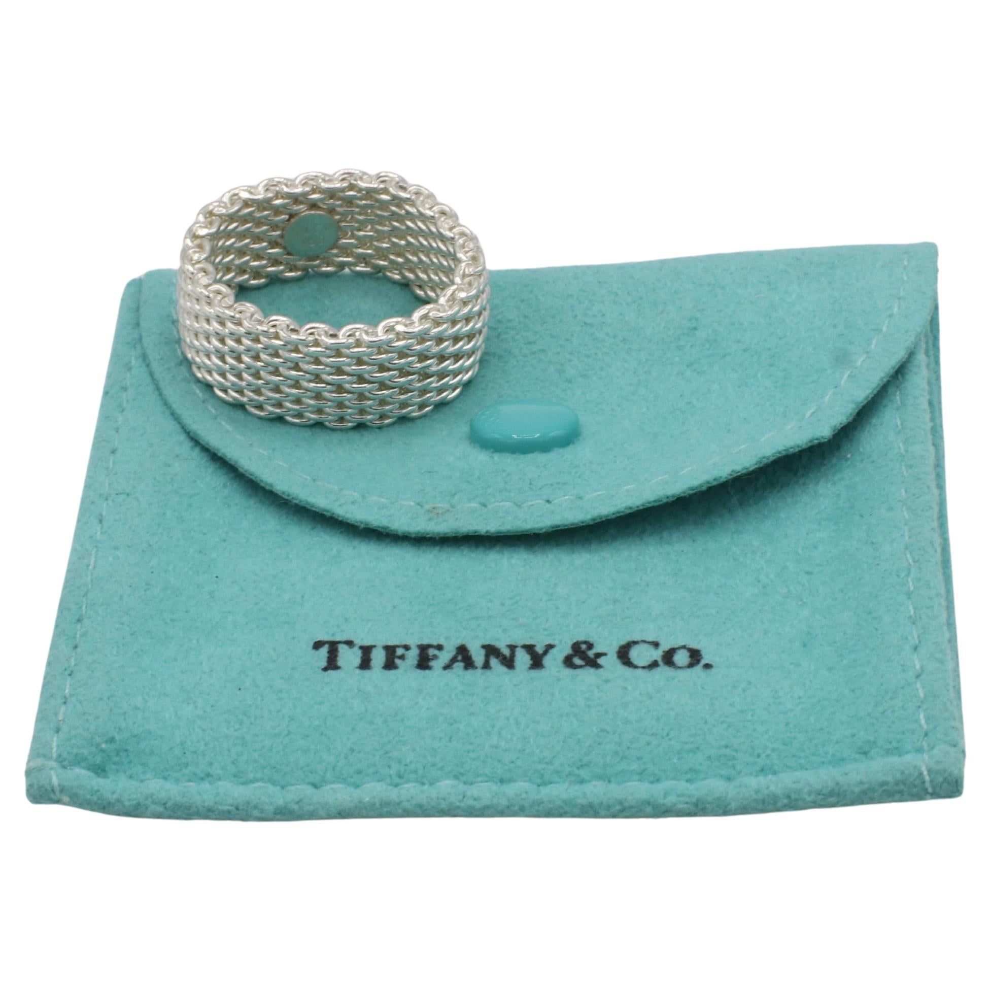 Tiffany & Co. Somerset Sterling Silver Mesh Band Ring 
Metal: Sterling silver 925
Weight: 9.37 grams
Width: 10mm
Size: 9 (US)
Signed: T&Co. 925
AT F35000604