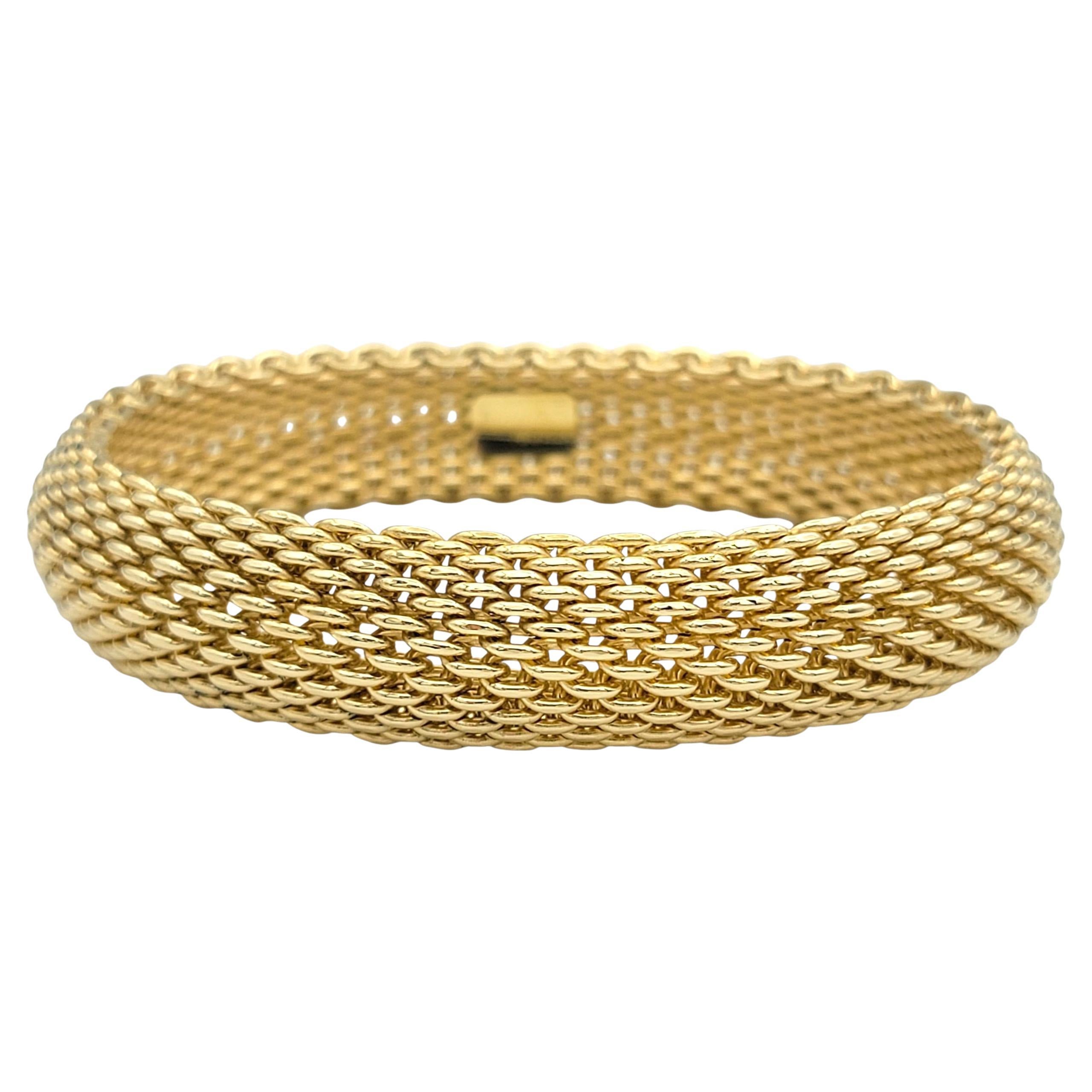 Tiffany & Co. Somerset Wide Mesh Bangle Bracelet in 18 Karat Yellow Gold For Sale